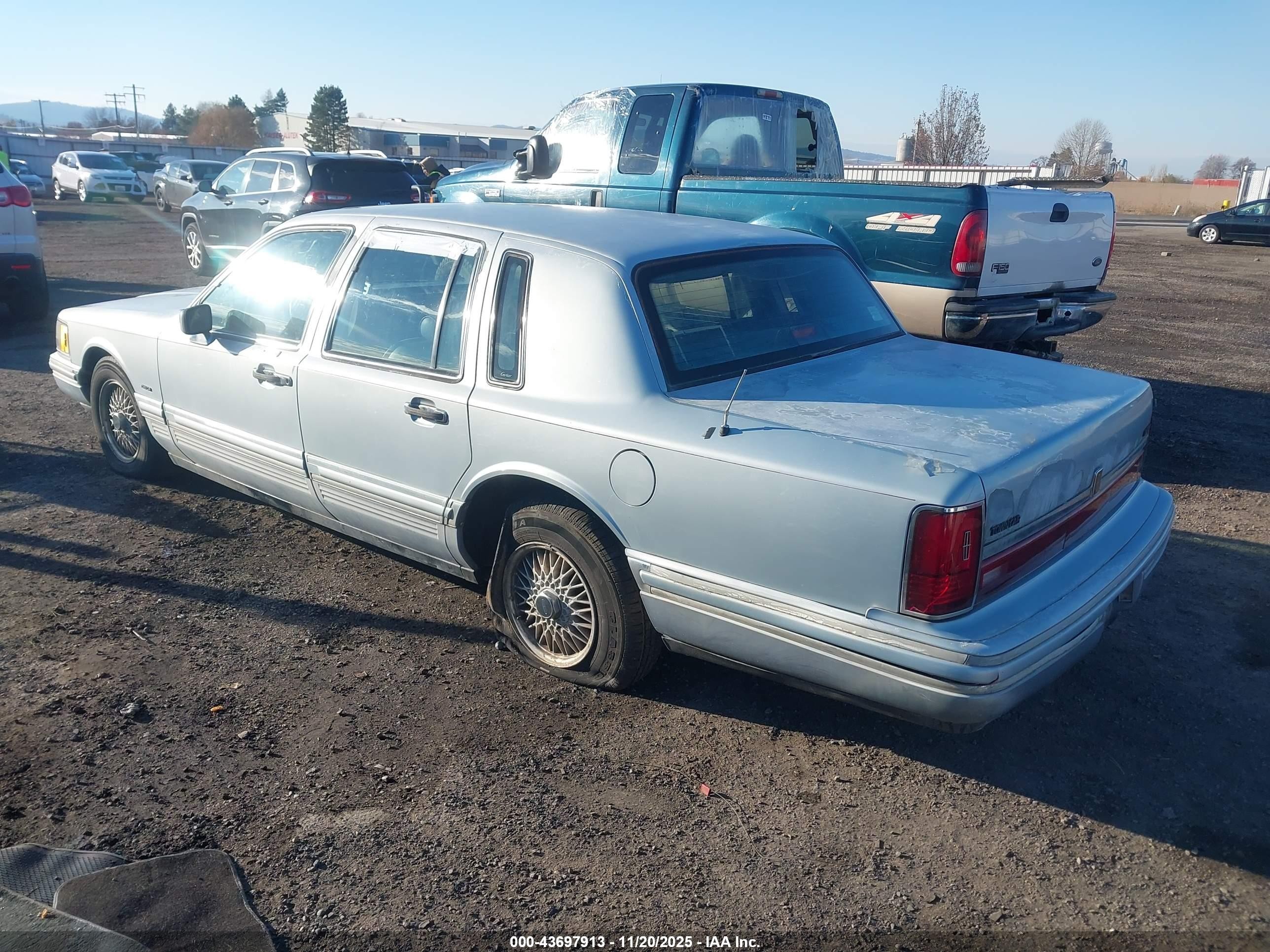 1991 Lincoln Town Car Cartier Серебряный vin: 1LNCM83W4MY644572