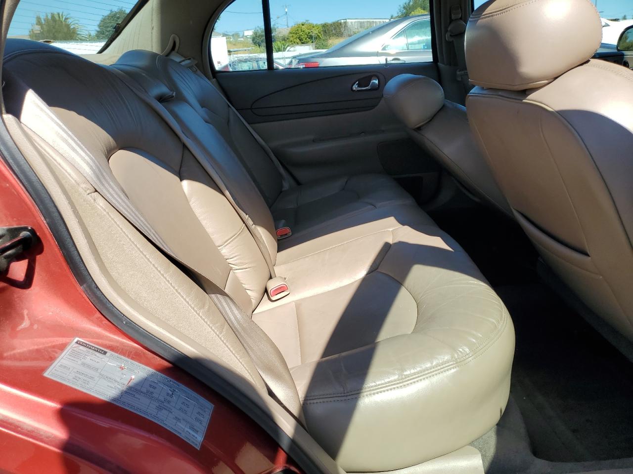 1998 Lincoln Continental Red vin: 1LNFM97V0WY605789