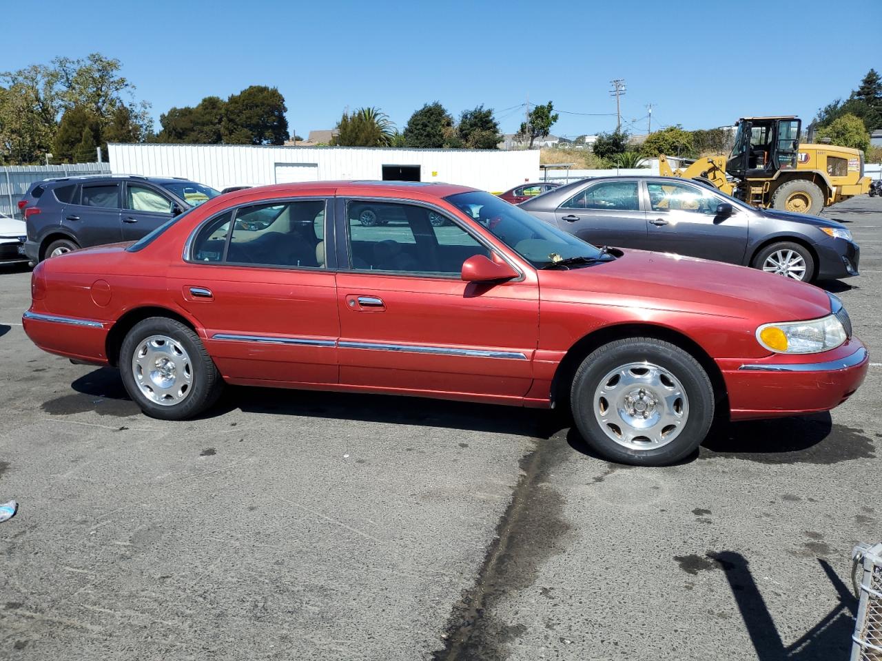 1998 Lincoln Continental Red vin: 1LNFM97V0WY605789