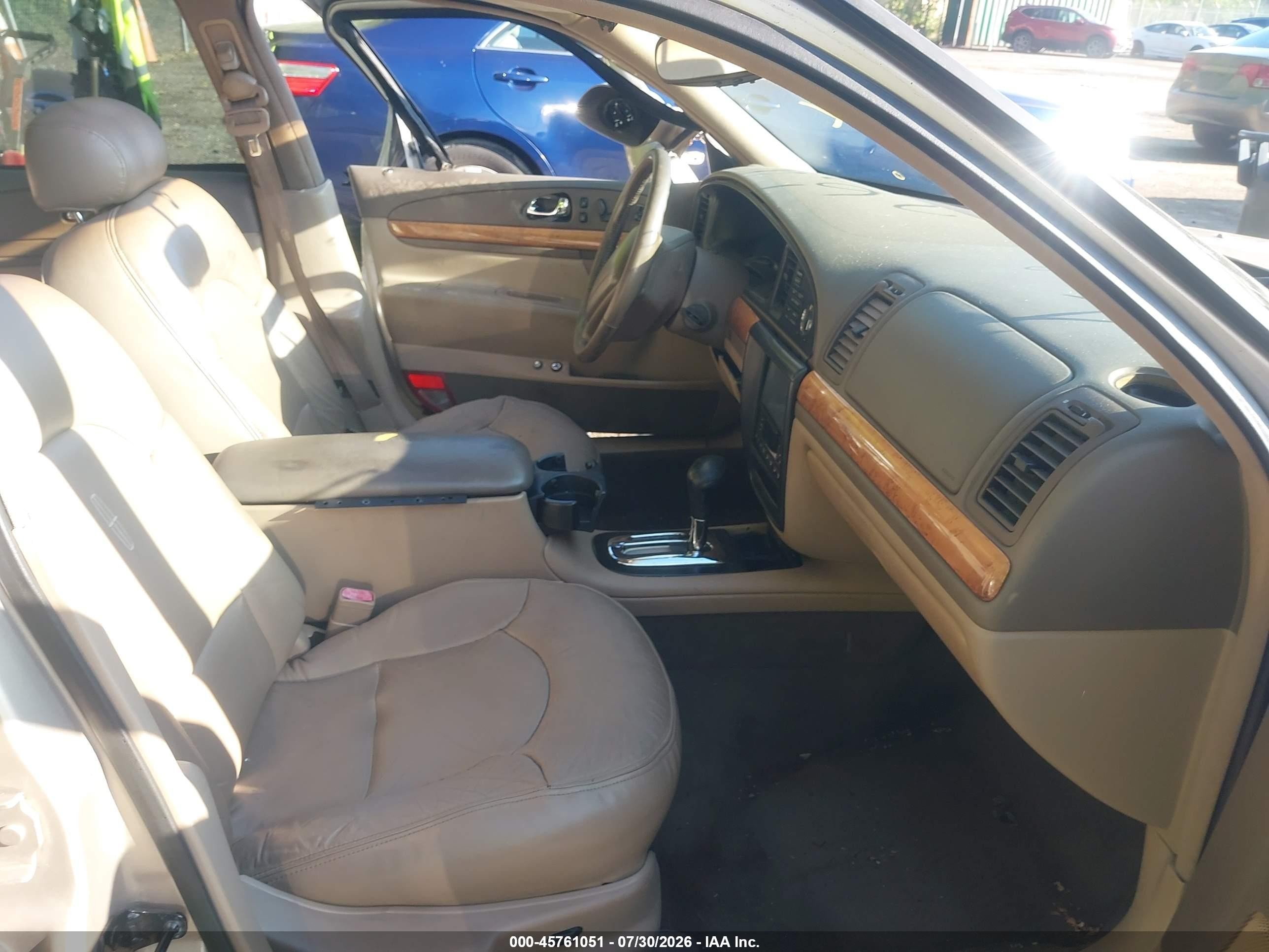 1998 Lincoln Continental   Gold vin: 1LNFM97V0WY735782