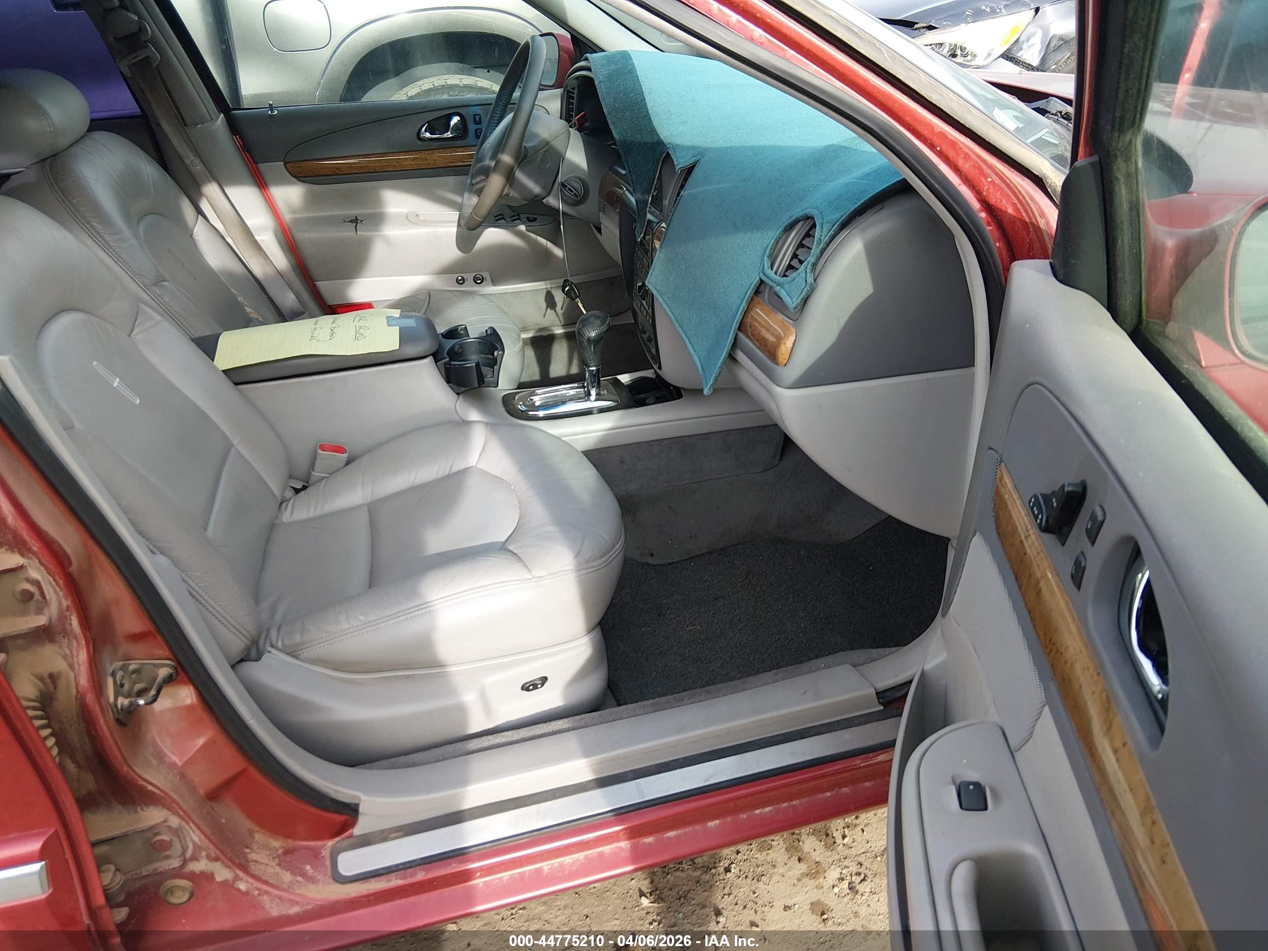 1998 Lincoln Continental   Red vin: 1LNFM97V4WY700470
