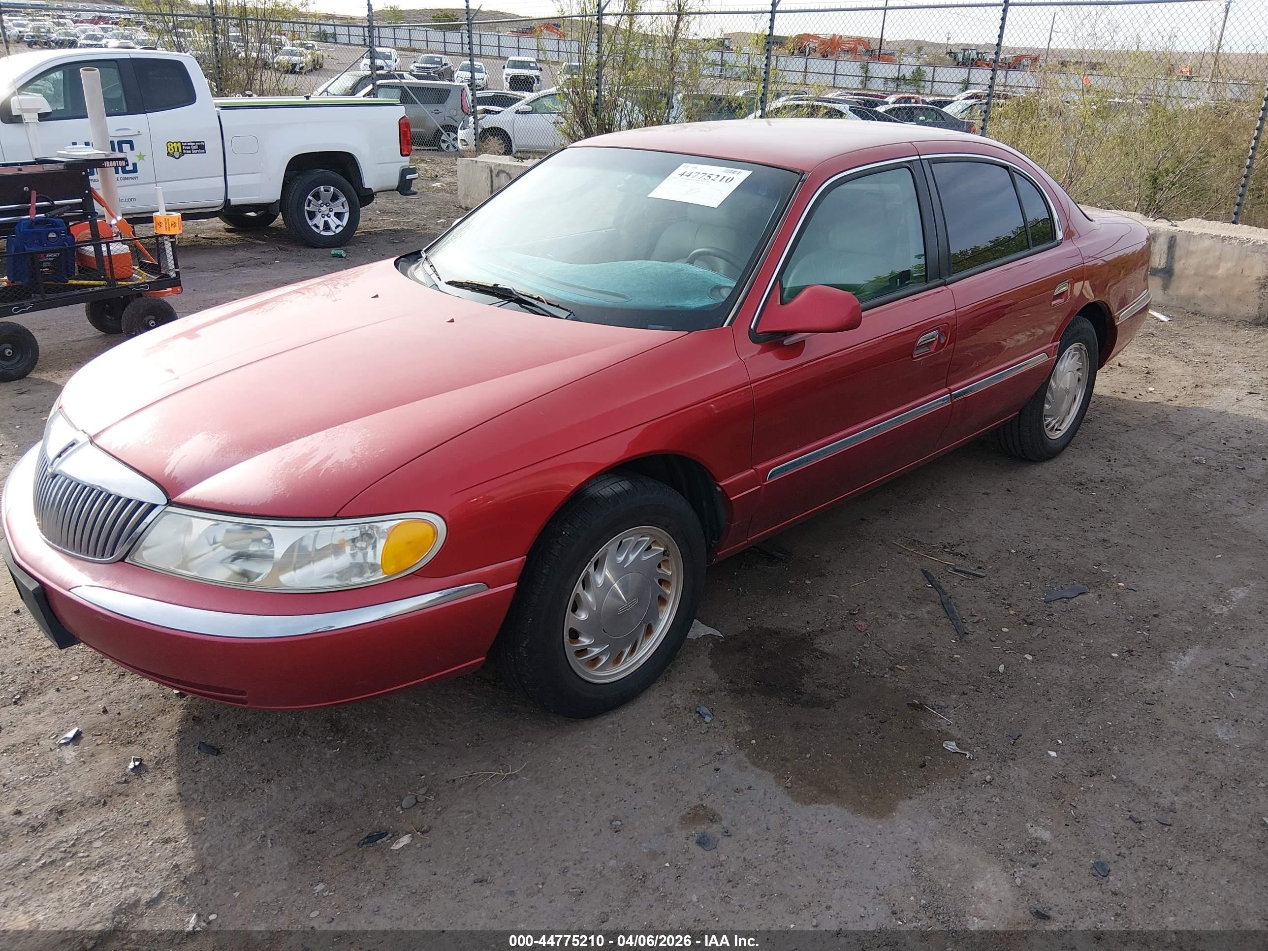 1998 Lincoln Continental   Red vin: 1LNFM97V4WY700470
