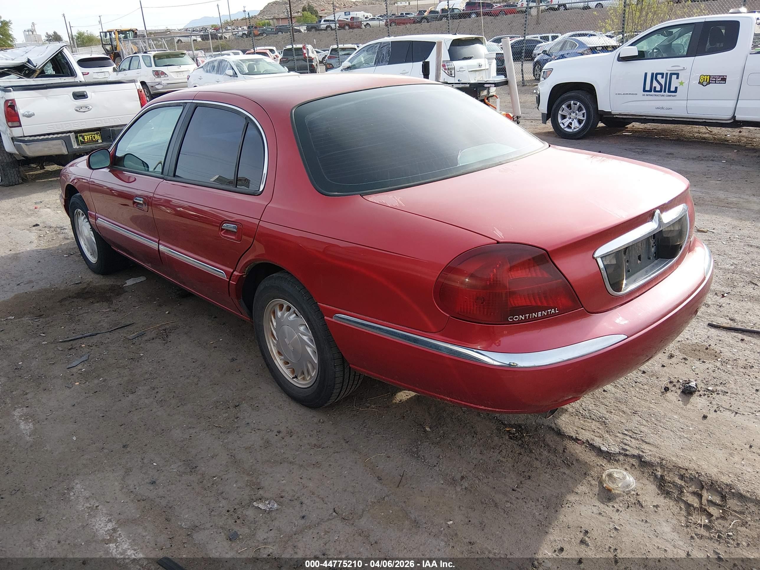 1998 Lincoln Continental   Red vin: 1LNFM97V4WY700470