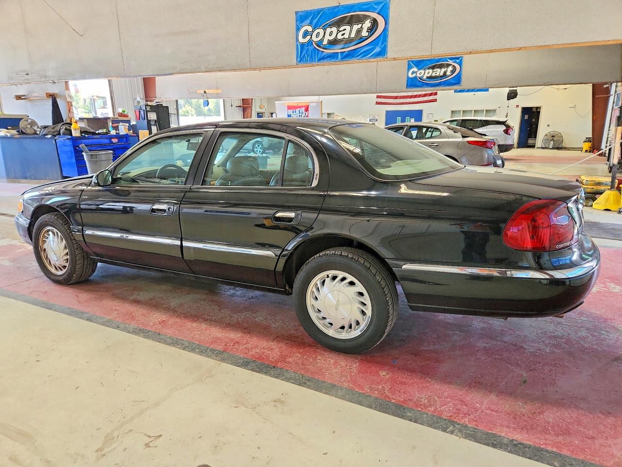 1998 Lincoln Continental Black vin: 1LNFM97V4WY742847