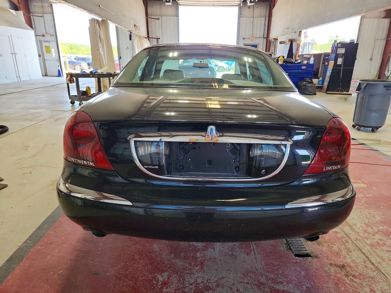 1998 Lincoln Continental Black vin: 1LNFM97V4WY742847
