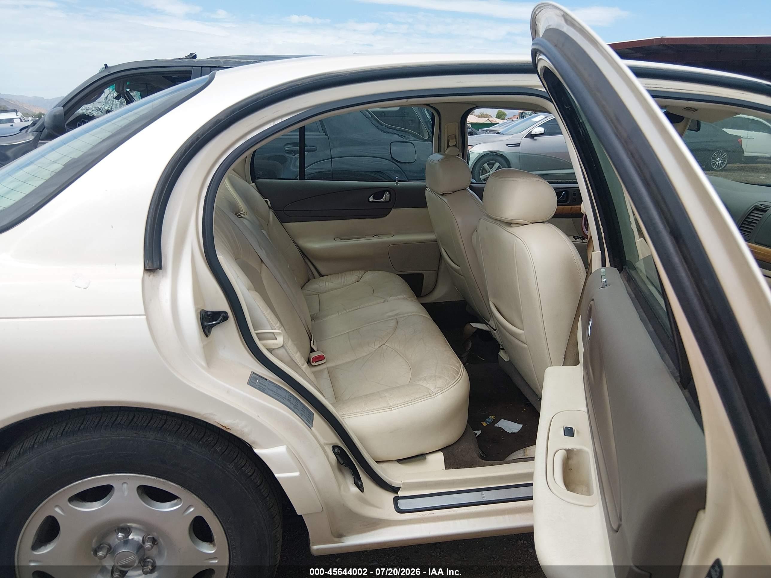 1998 Lincoln Continental   Кремовый vin: 1LNFM97V6WY626274