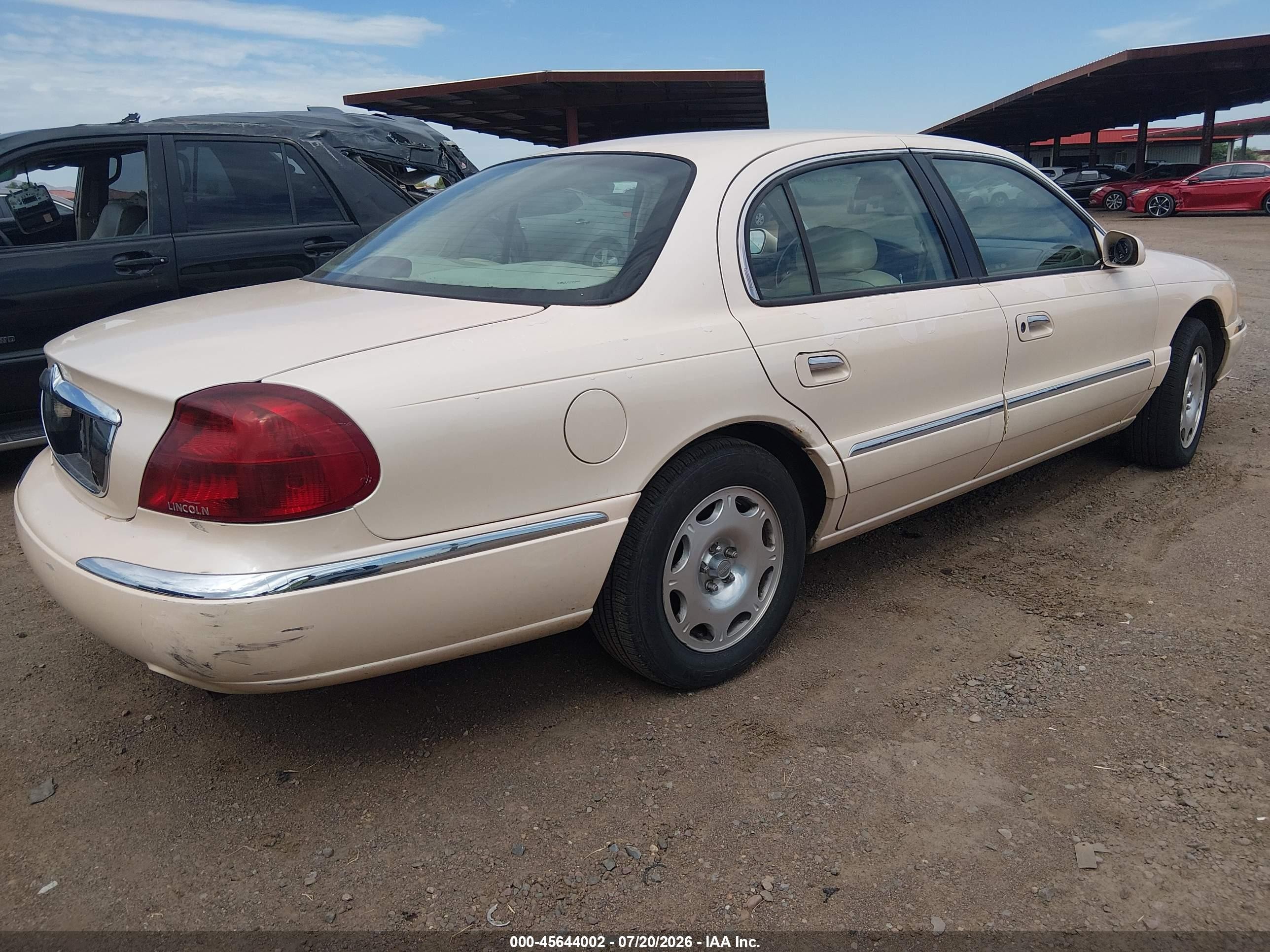 1998 Lincoln Continental   Кремовый vin: 1LNFM97V6WY626274