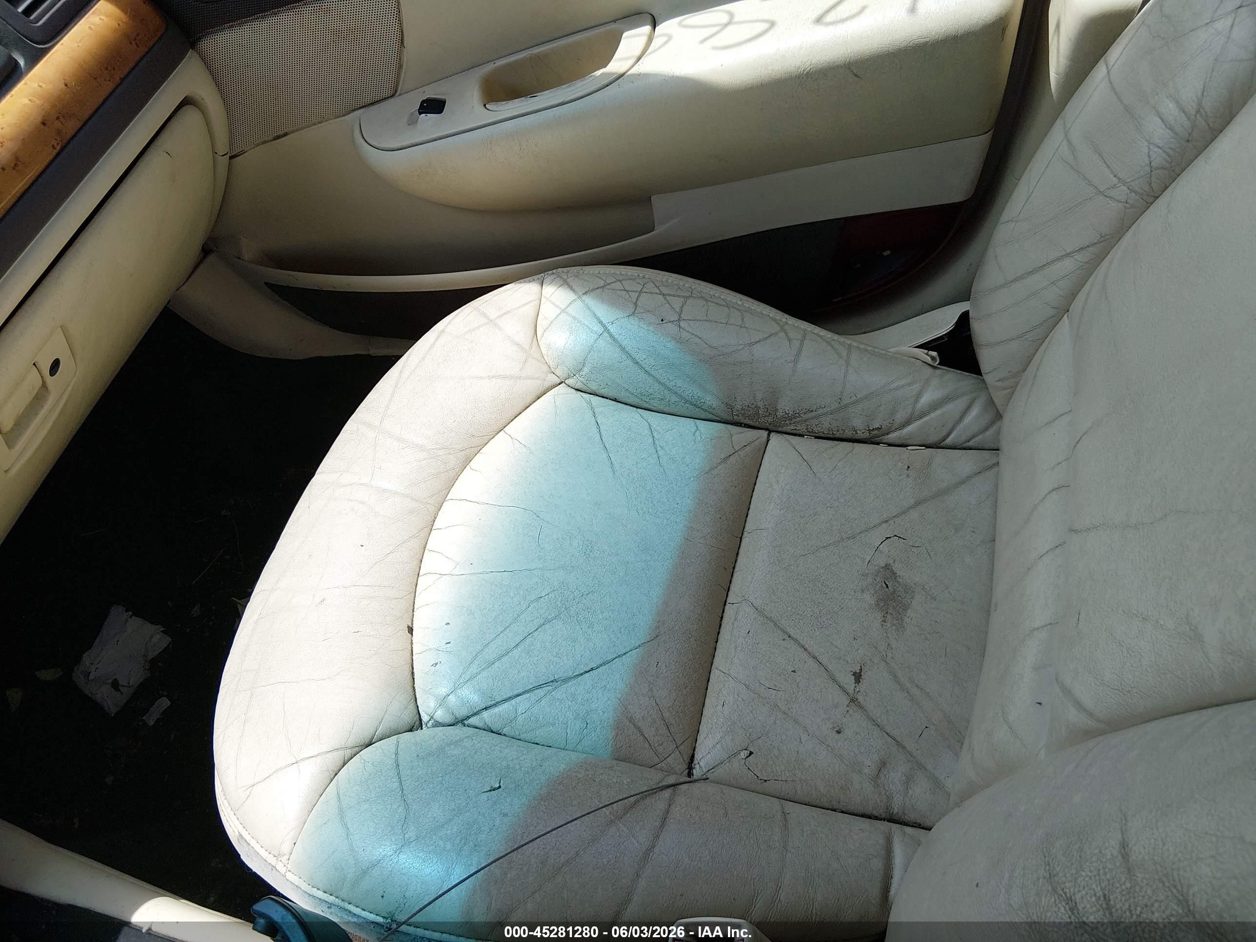 1998 Lincoln Continental   Tan vin: 1LNFM97V7WY634111