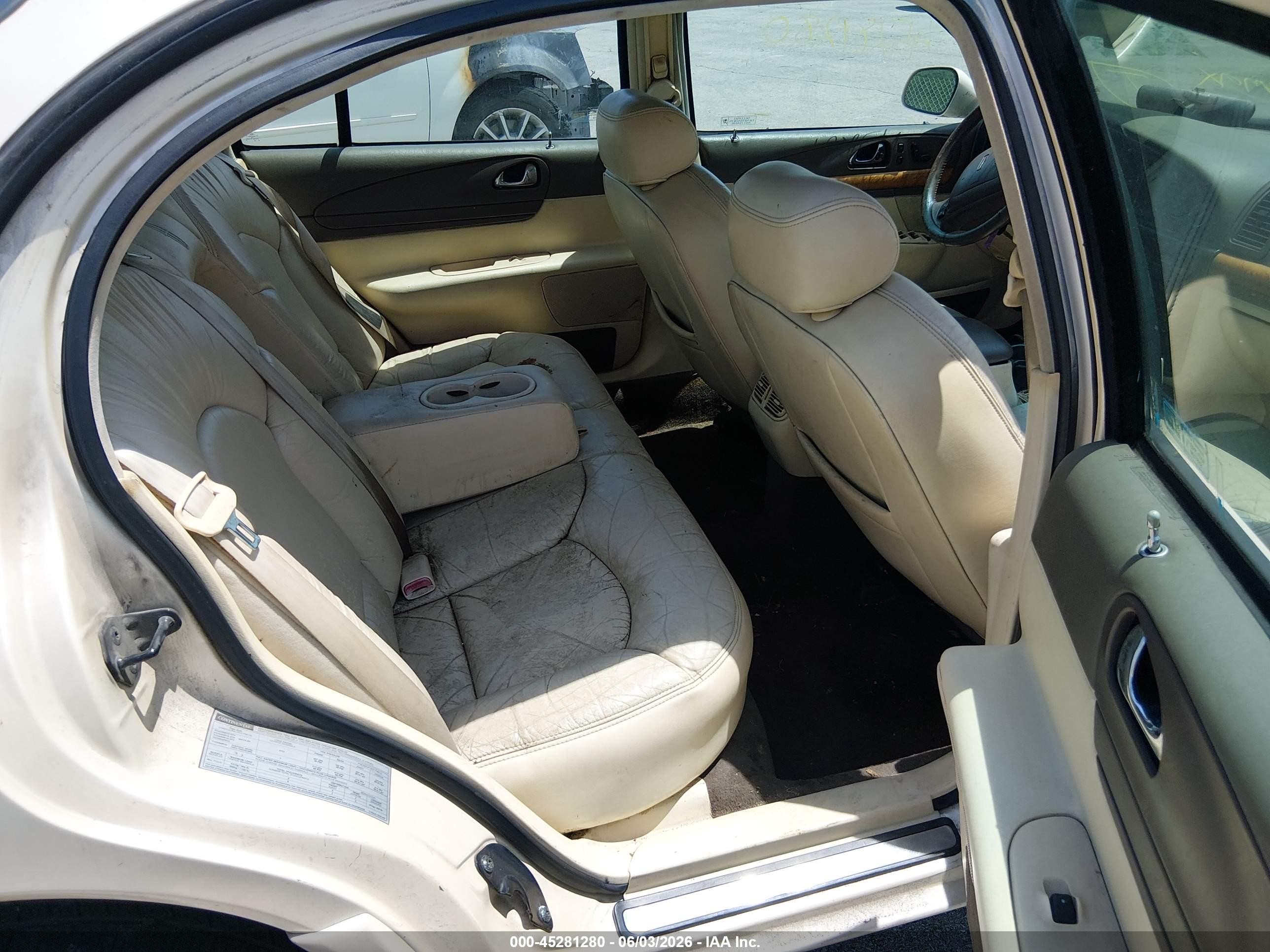 1998 Lincoln Continental   Tan vin: 1LNFM97V7WY634111