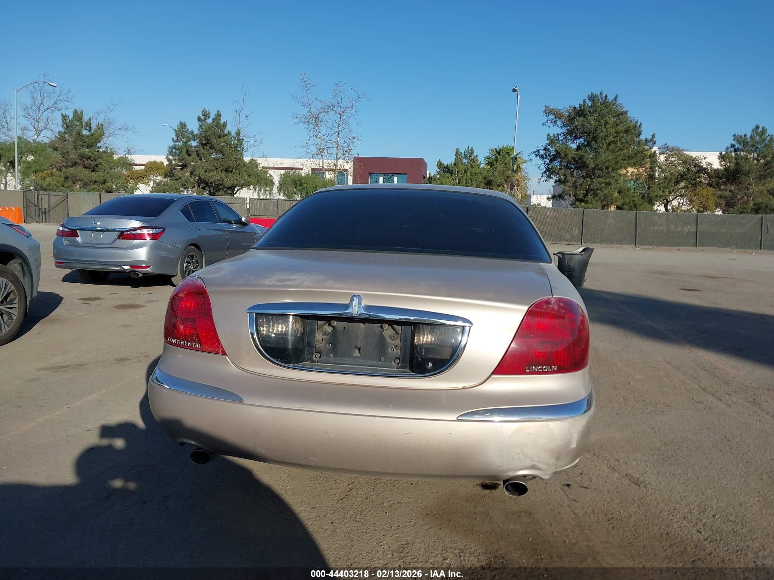 1998 Lincoln Continental   Champagne vin: 1LNFM97V7WY658487