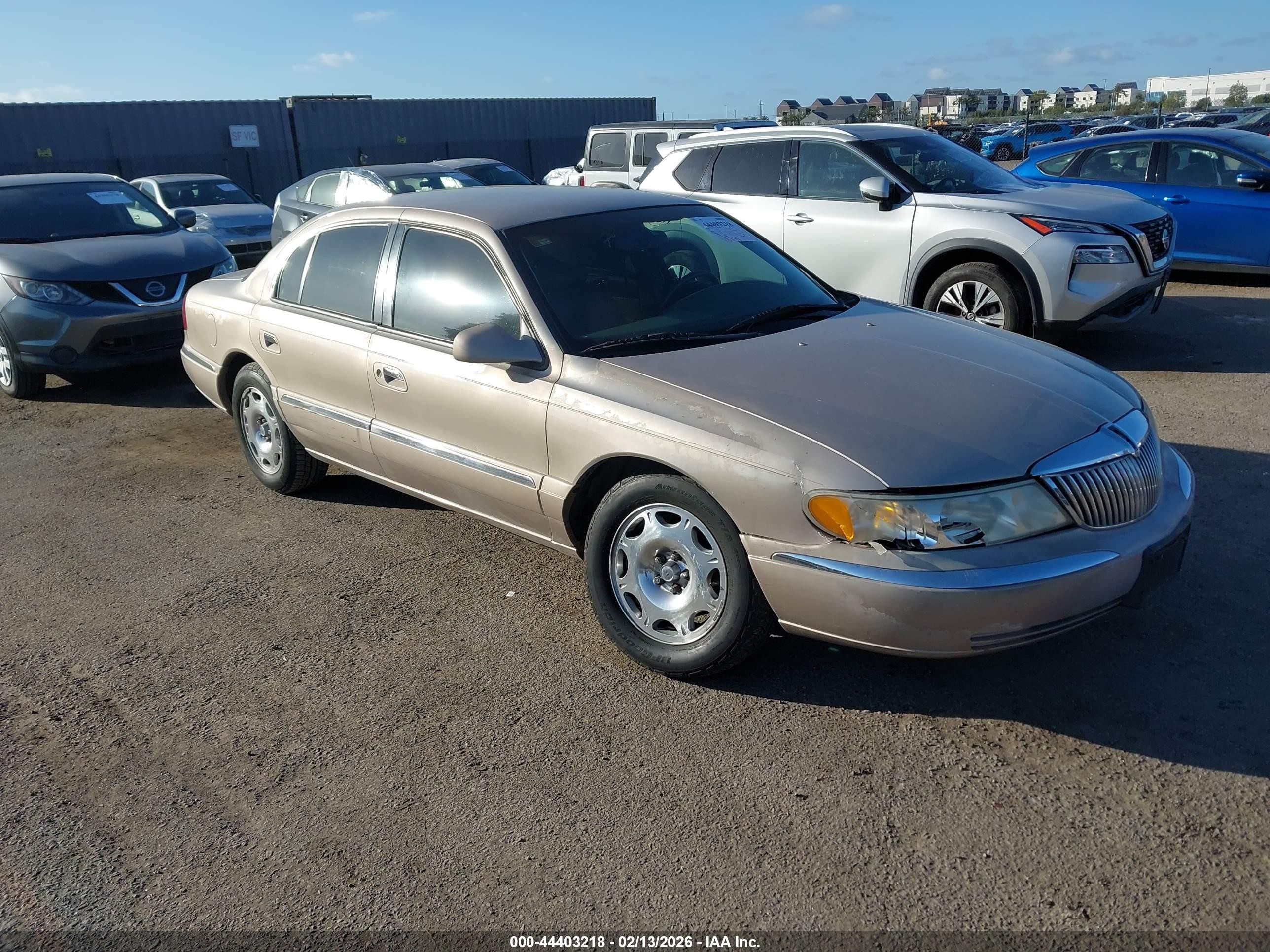 1998 Lincoln Continental   Champagne vin: 1LNFM97V7WY658487
