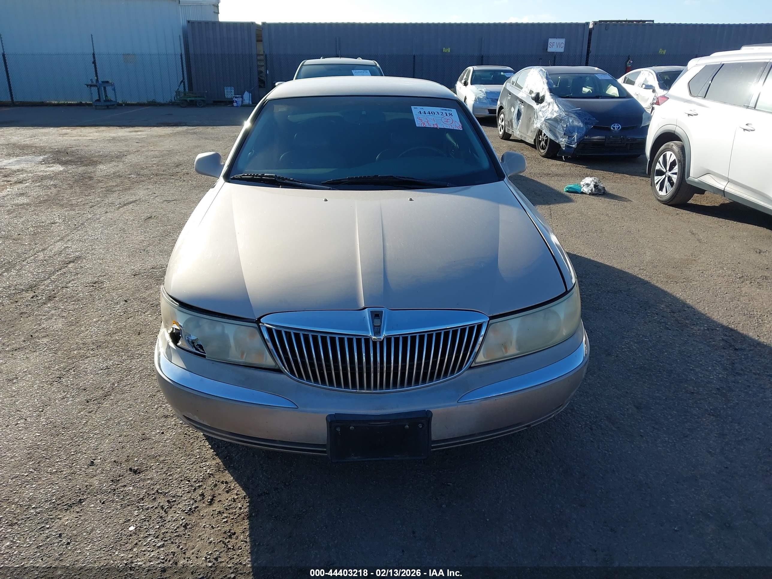 1998 Lincoln Continental   Champagne vin: 1LNFM97V7WY658487