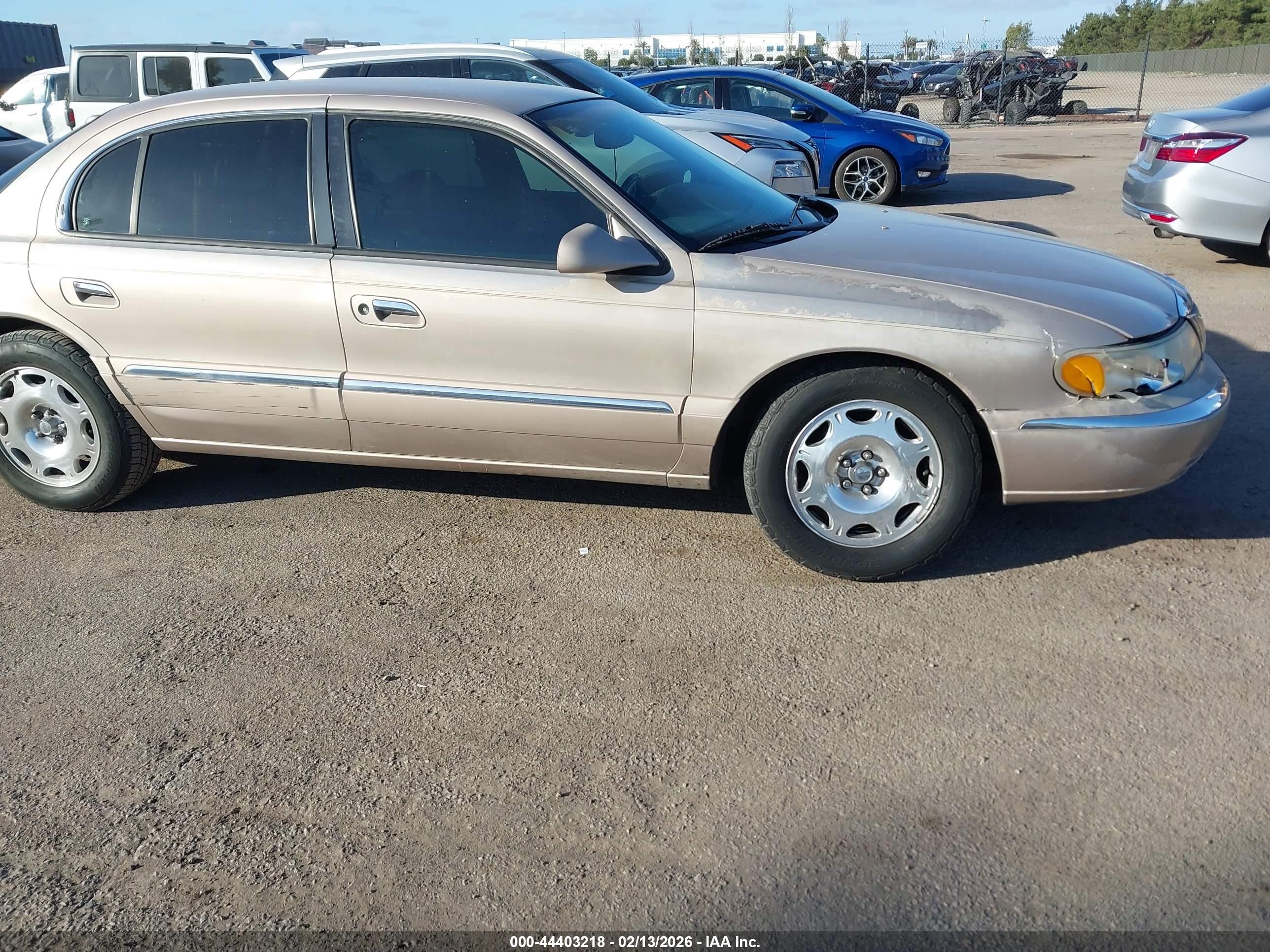 1998 Lincoln Continental   Champagne vin: 1LNFM97V7WY658487