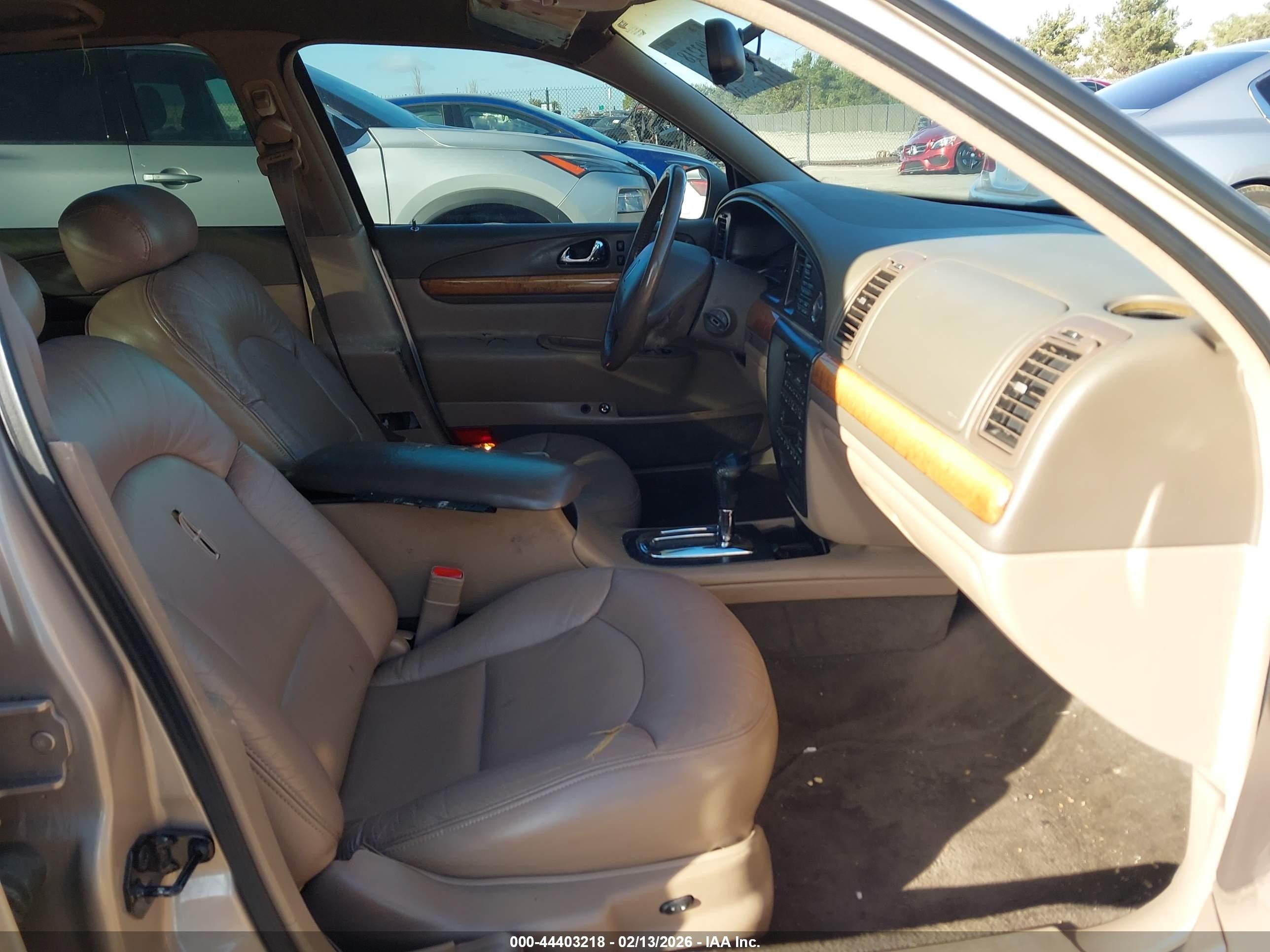 1998 Lincoln Continental   Champagne vin: 1LNFM97V7WY658487