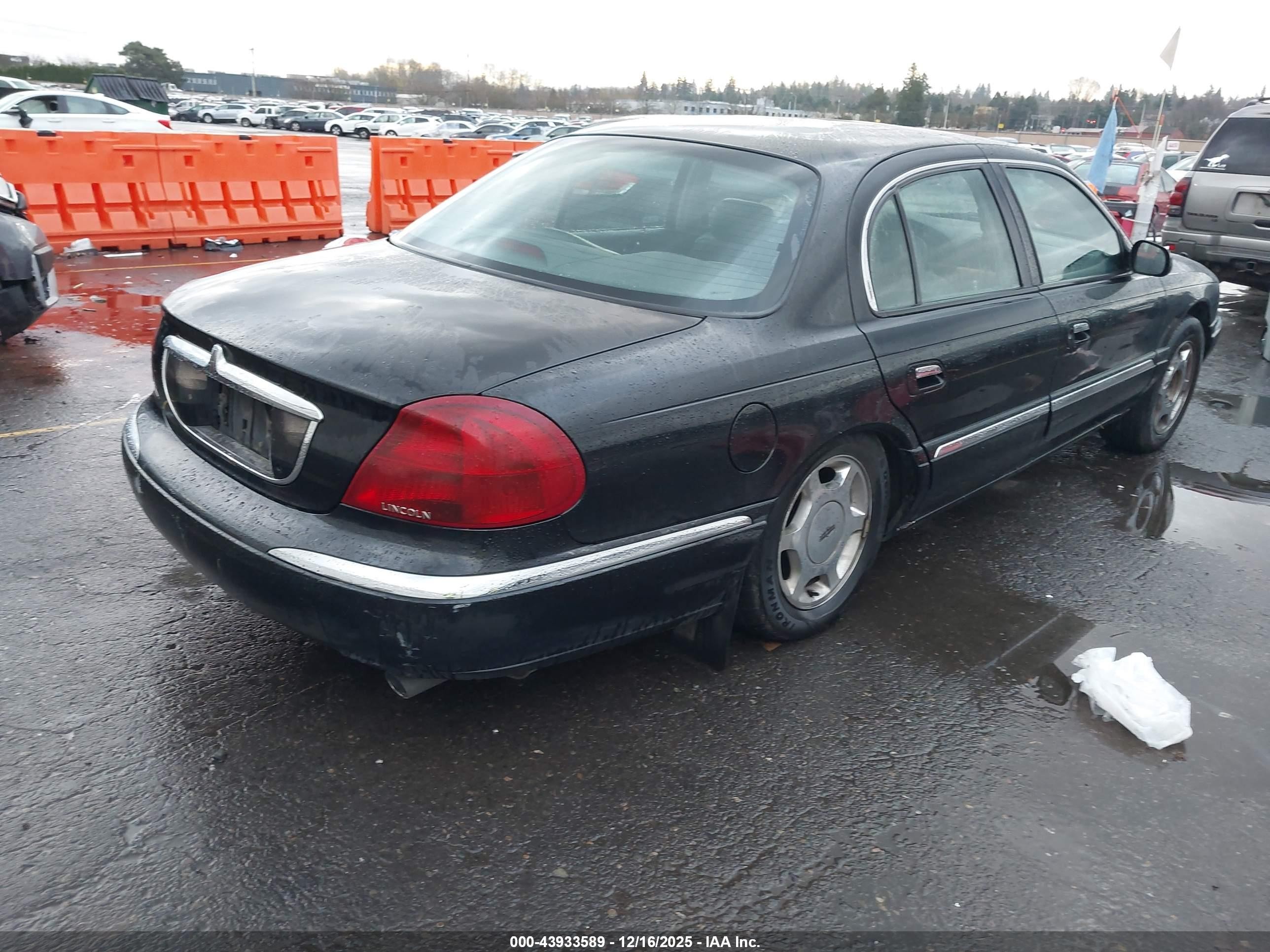 1998 Lincoln Continental   Black vin: 1LNFM97V9WY676425