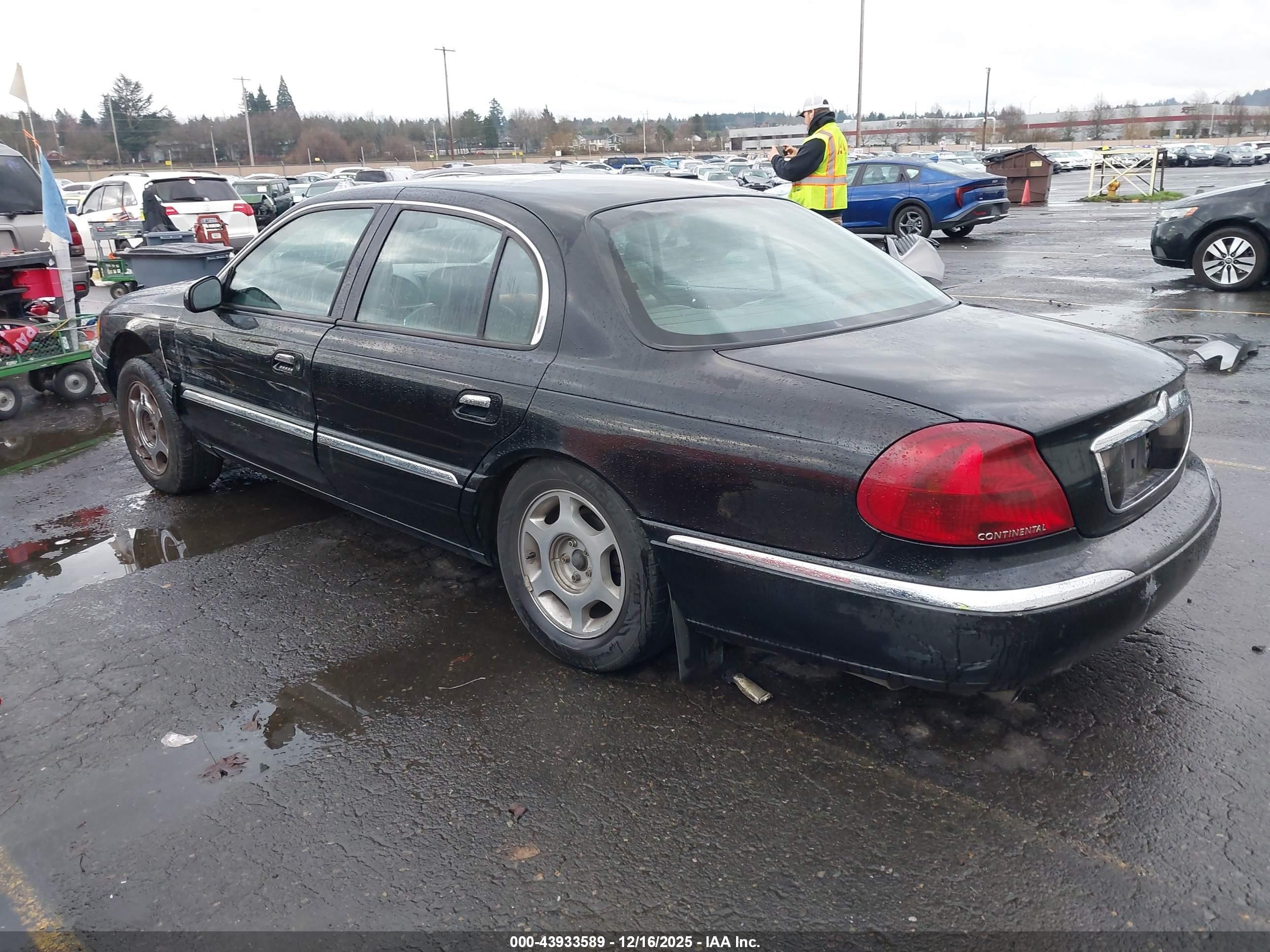 1998 Lincoln Continental   Black vin: 1LNFM97V9WY676425