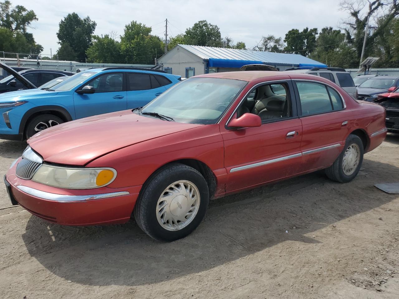 1998 Lincoln Continental Red vin: 1LNFM97V9WY685061