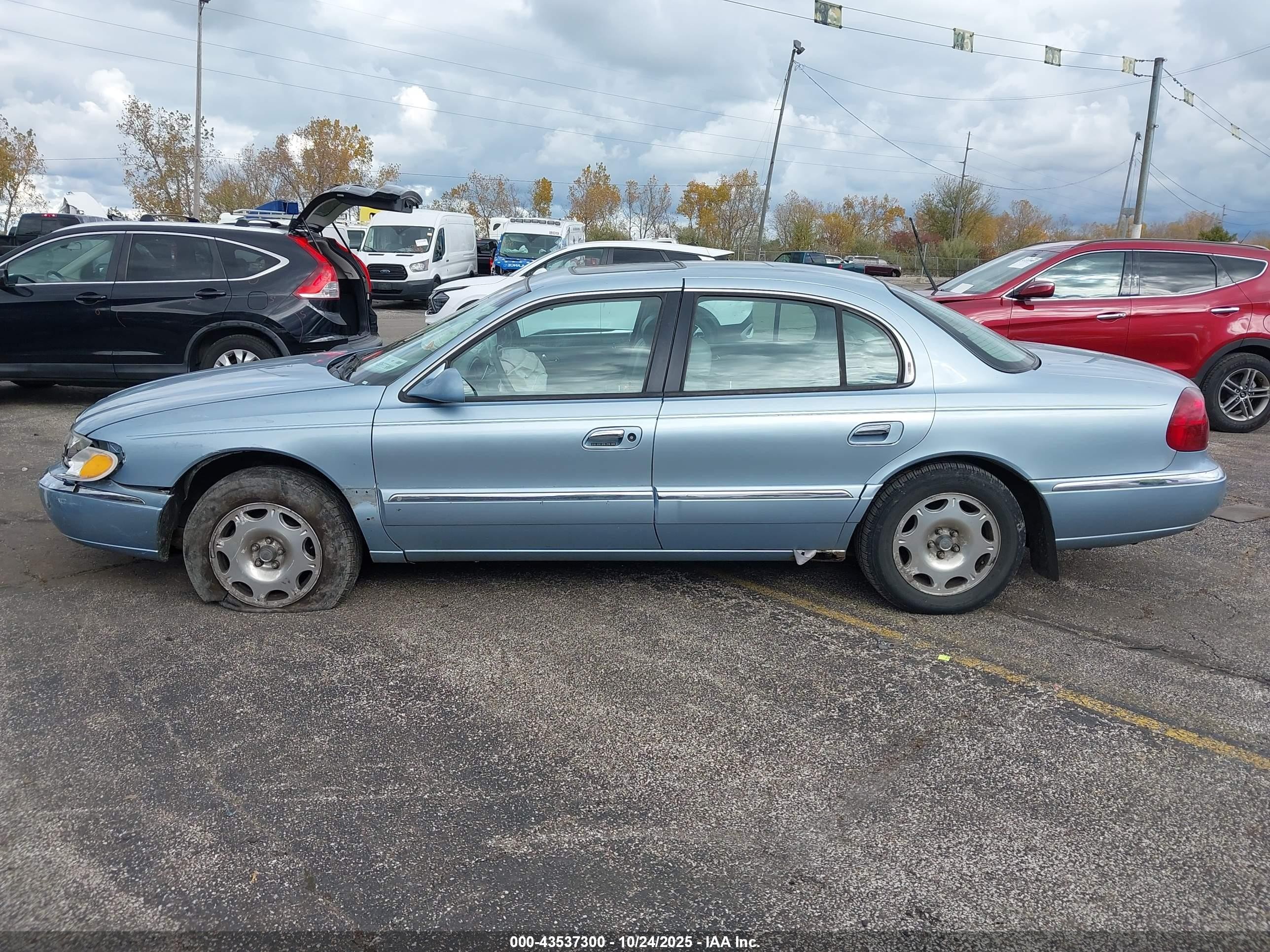 1998 Lincoln Continental   Blue vin: 1LNFM97VXWY658189
