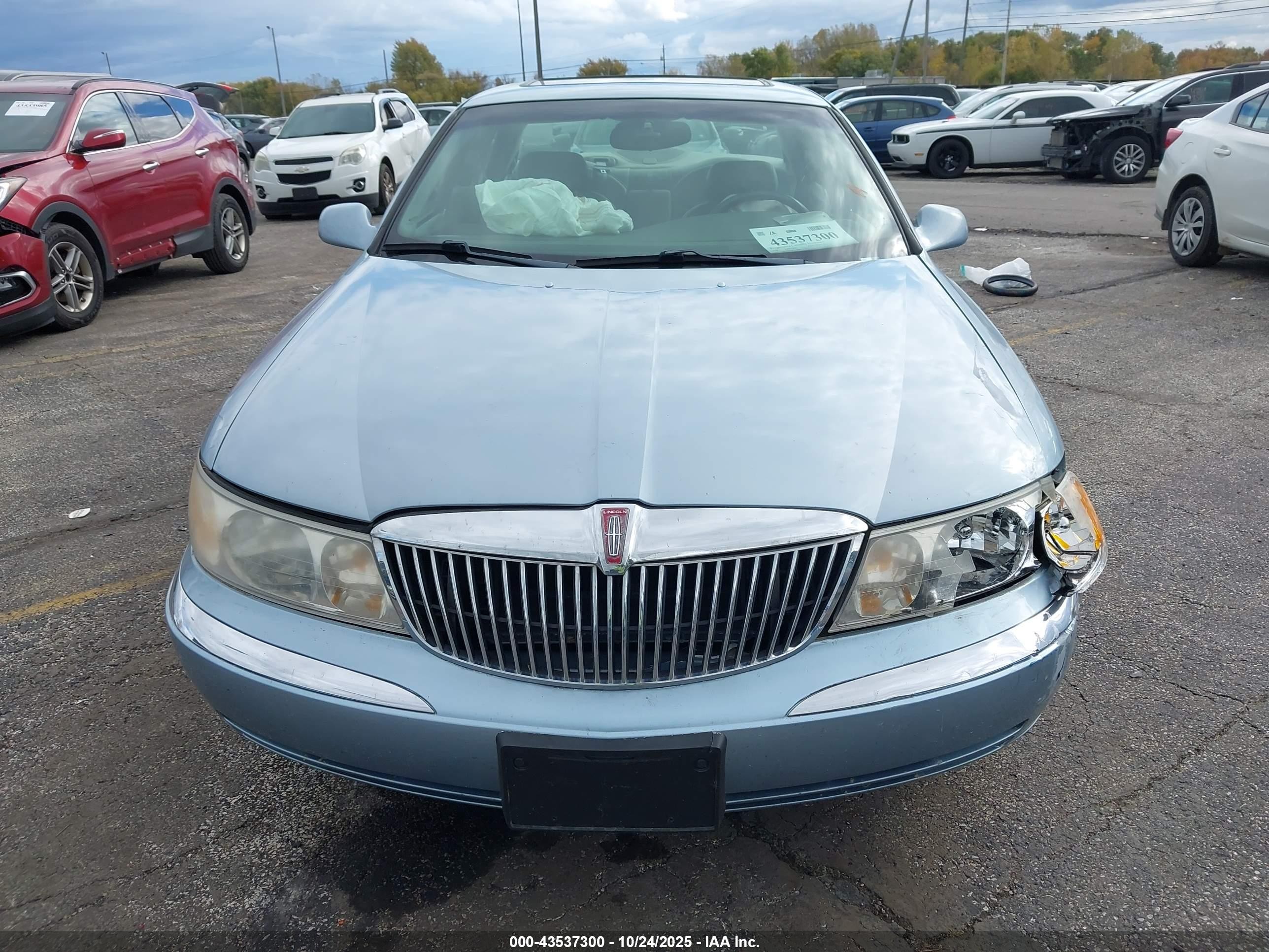 1998 Lincoln Continental   Blue vin: 1LNFM97VXWY658189