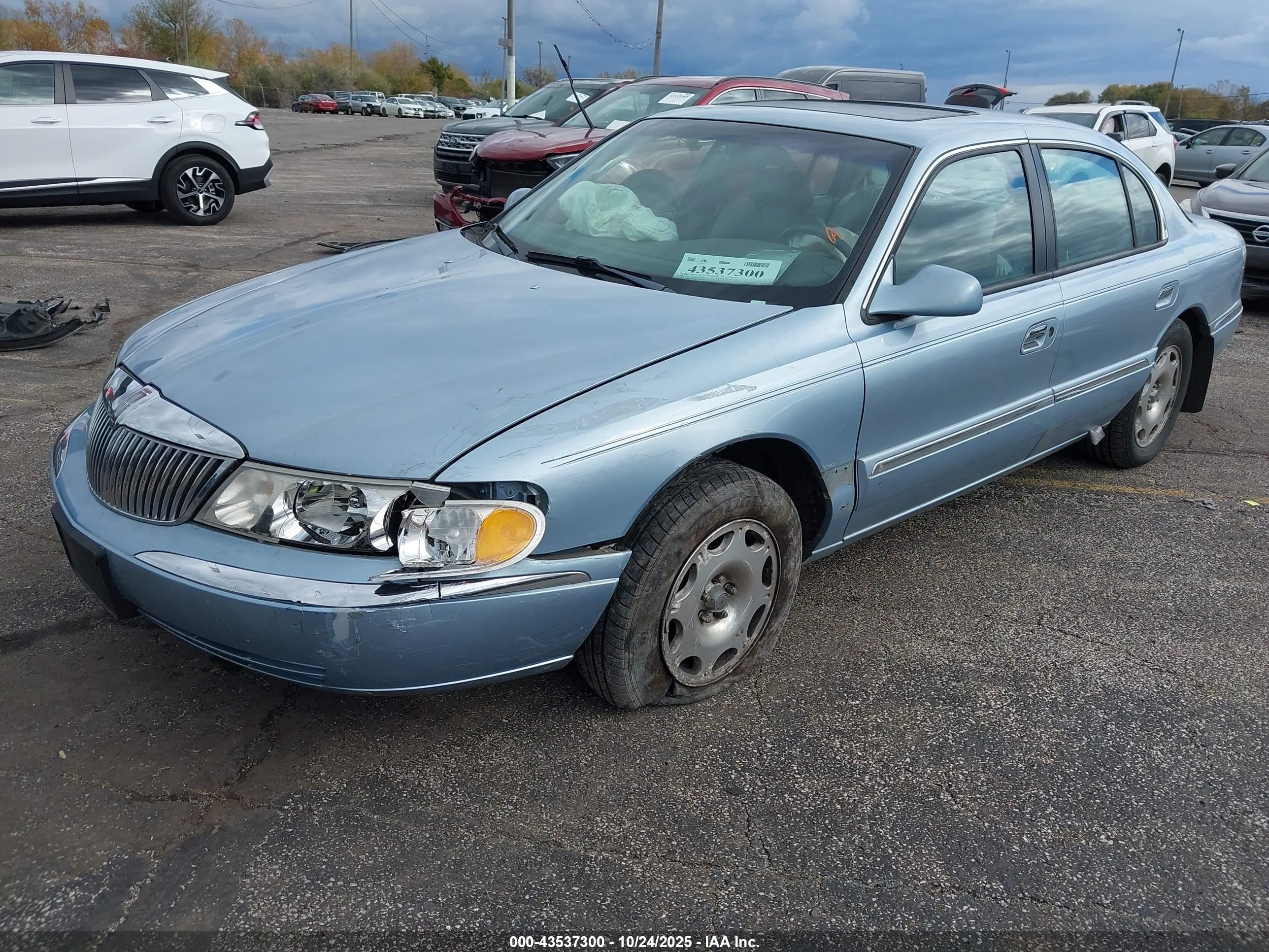 1998 Lincoln Continental   Blue vin: 1LNFM97VXWY658189