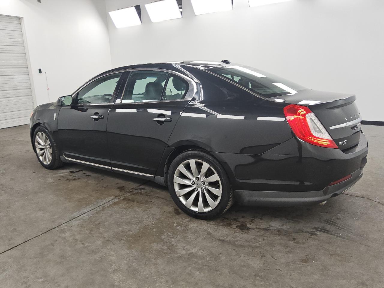 2015 Lincoln Mks Black vin: 1LNHL9DK8FG605079 Damage: Left Qtr Panel, Dent(S) W/No Paint Dmg, 5 To 6 Inches