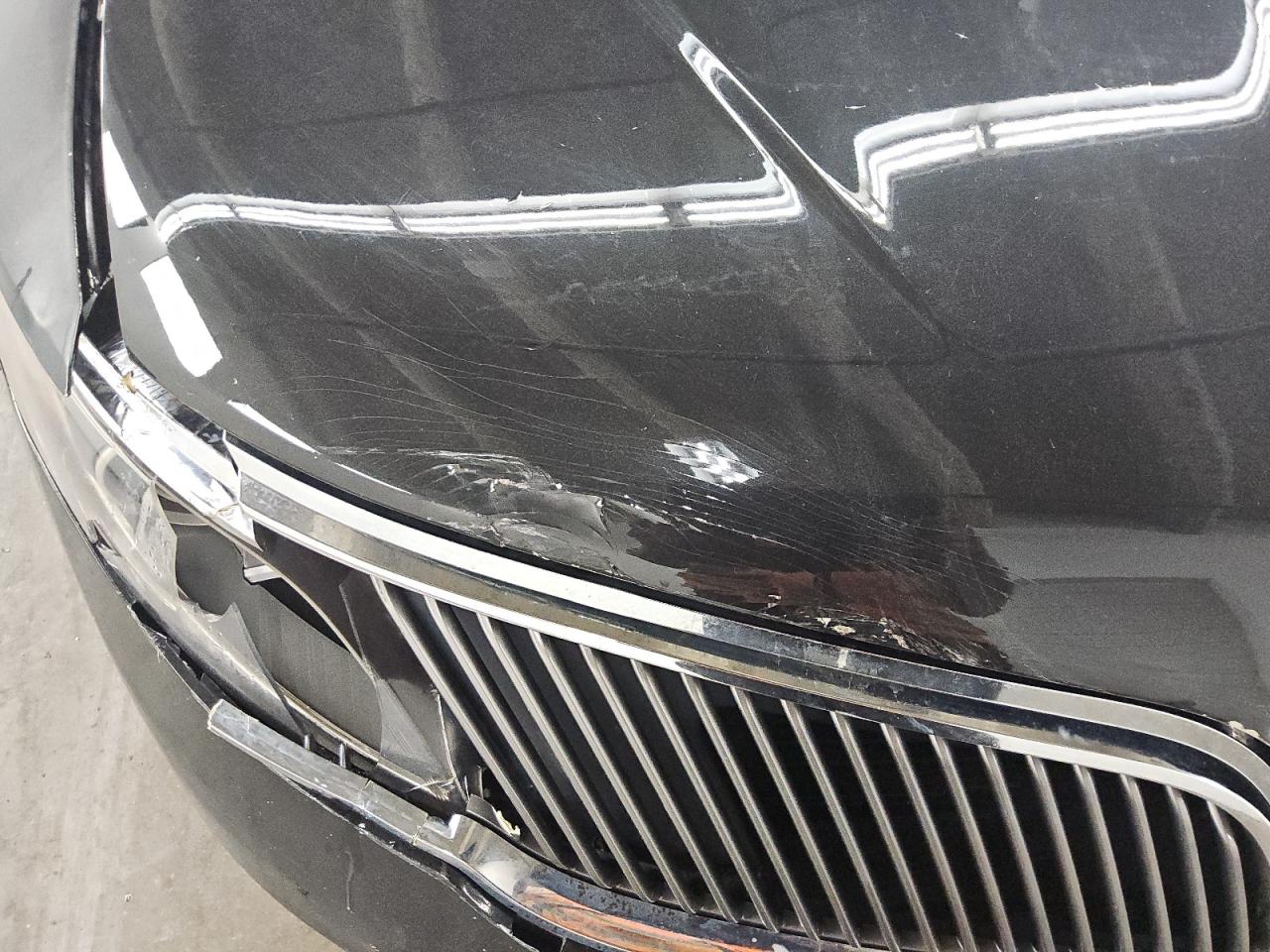 2015 Lincoln Mks Black vin: 1LNHL9DK8FG605079 Damage: Hood, Dent(S) W/ Paint Dmg, 5 To 6 Inches