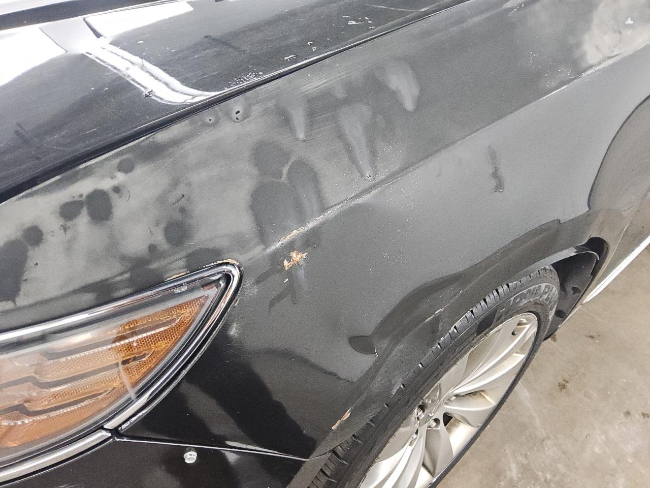2015 Lincoln Mks Black vin: 1LNHL9DK8FG605079 Damage: Left Front Fender, Dent(S) W/ Paint Dmg, 9 To 10 Inches