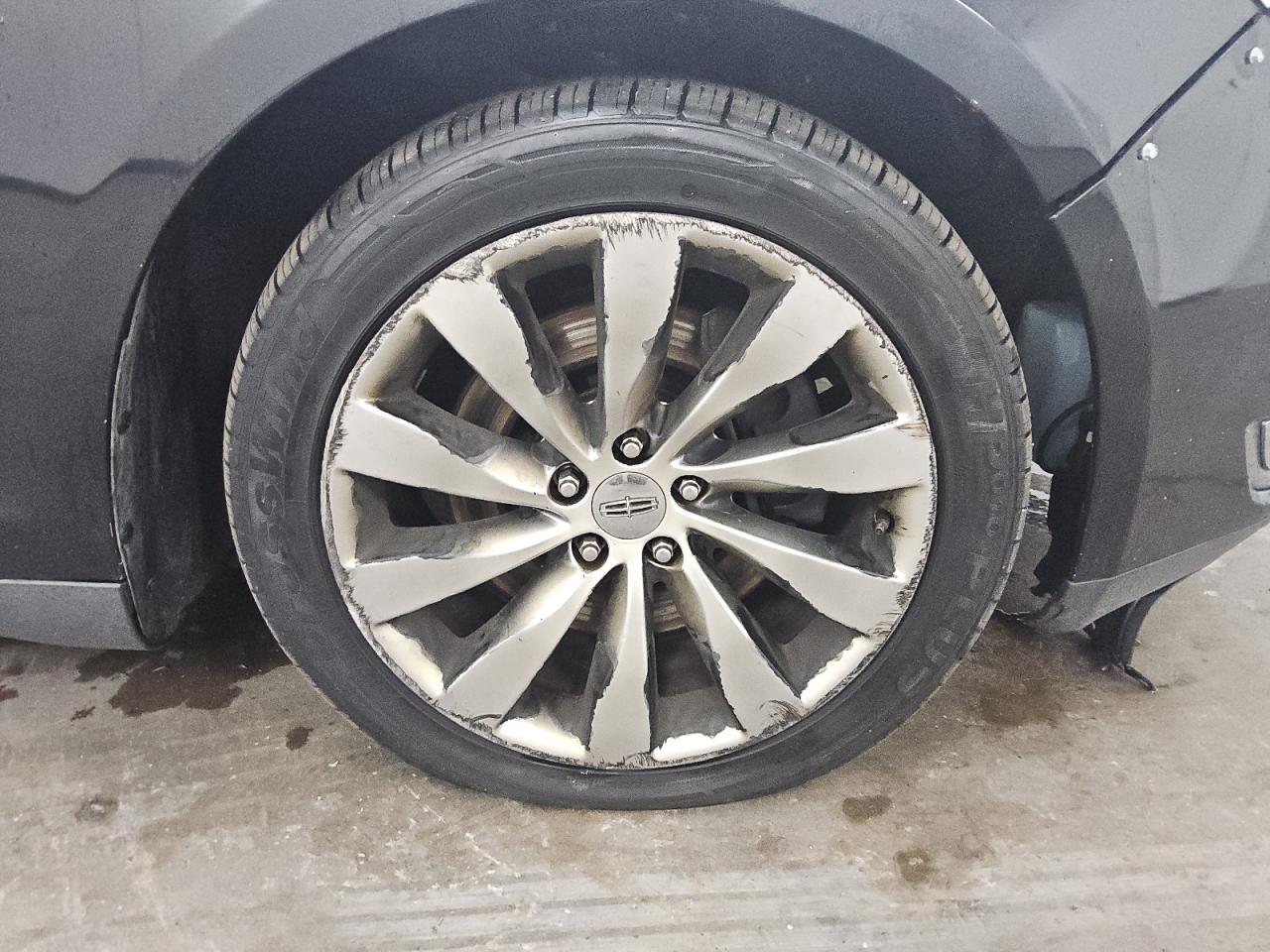 2015 Lincoln Mks Black vin: 1LNHL9DK8FG605079 Damage: Right Front Wheel, Curb Rash, > 12 Inches