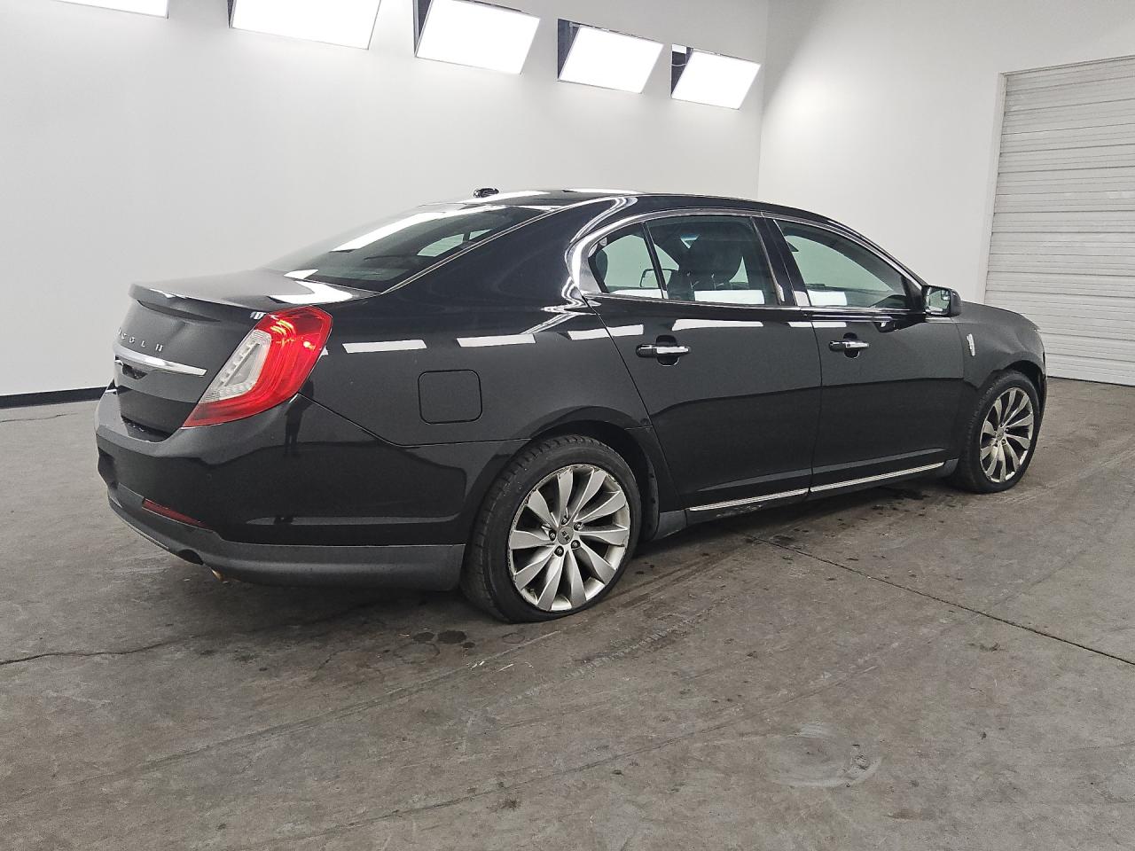 2015 Lincoln Mks Black vin: 1LNHL9DK8FG605079 Damage: Right Qtr Panel, Dent(S) W/ Paint Dmg, 1 To 2 Inches