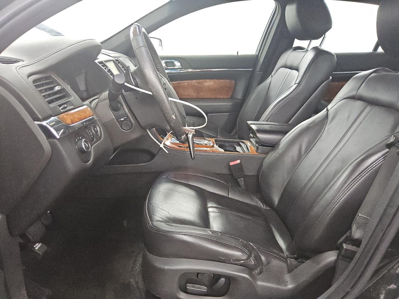 2015 Lincoln Mks Black vin: 1LNHL9DK8FG605079 Damage: Left Front Seat Cushion, Worn, Replacement Required