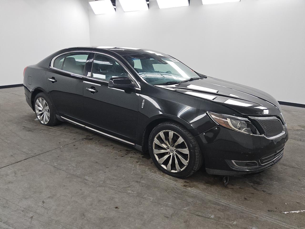 2015 Lincoln Mks Black vin: 1LNHL9DK8FG605079 Damage: Right Apron, Previous Repair, Acceptable