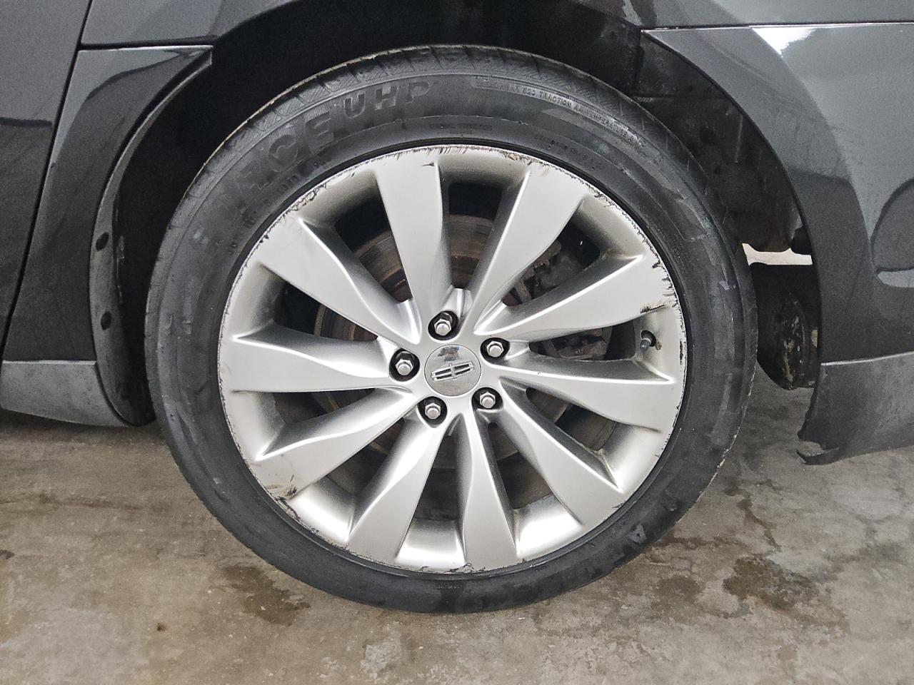 2015 Lincoln Mks Black vin: 1LNHL9DK8FG605079 Damage: Rr Axle Assembly, Broken, Replacement Required