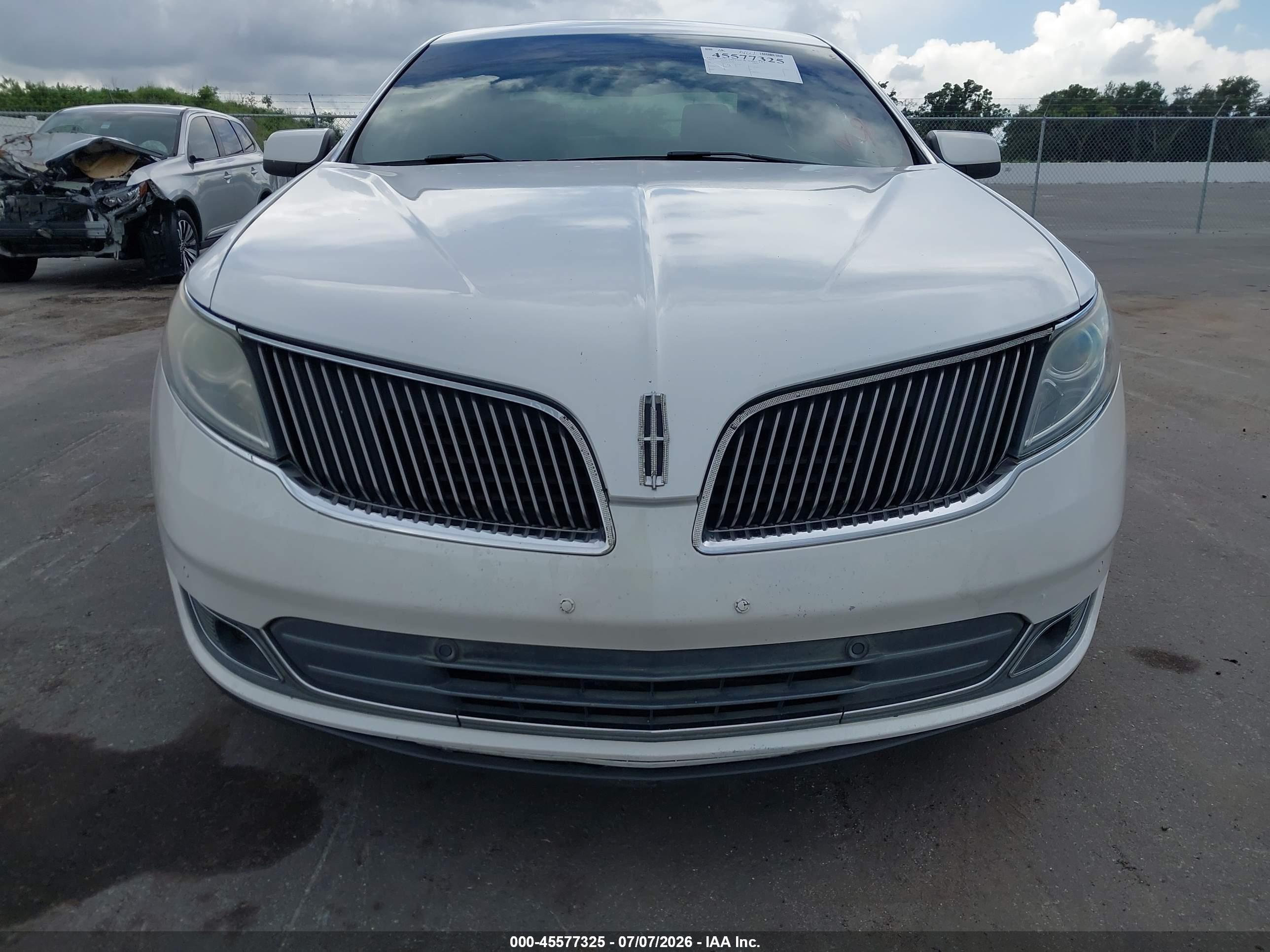 2013 Lincoln Mks   White vin: 1LNHL9EK2DG604439