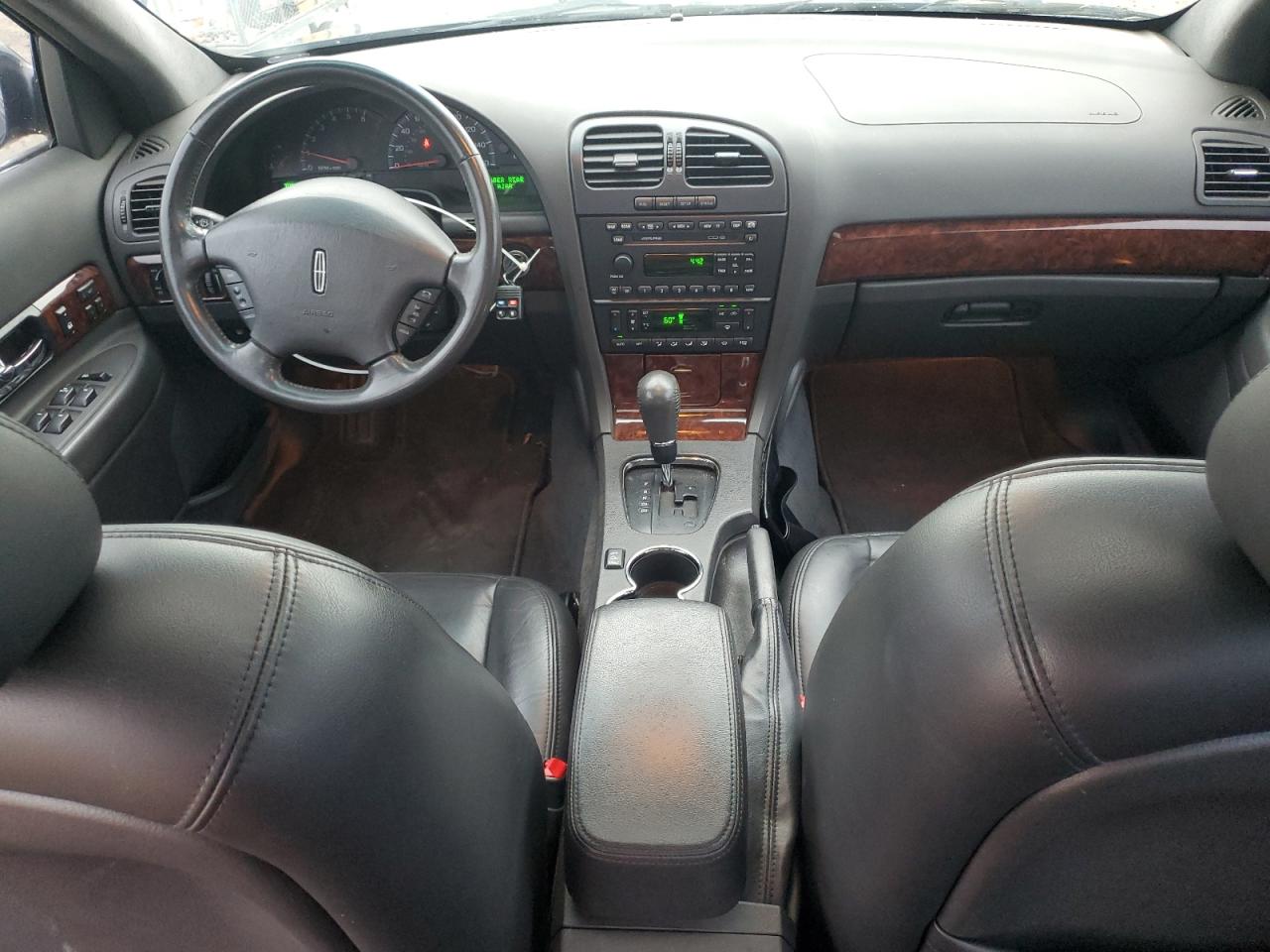 2001 Lincoln Ls Черный vin: 1LNHM87A41Y603505