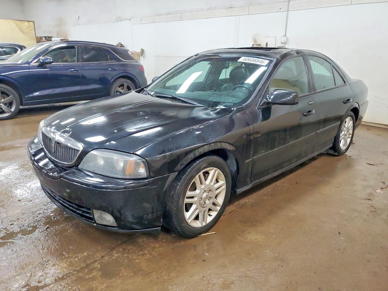 2005 Lincoln Ls Черный vin: 1LNHM87A85Y662790