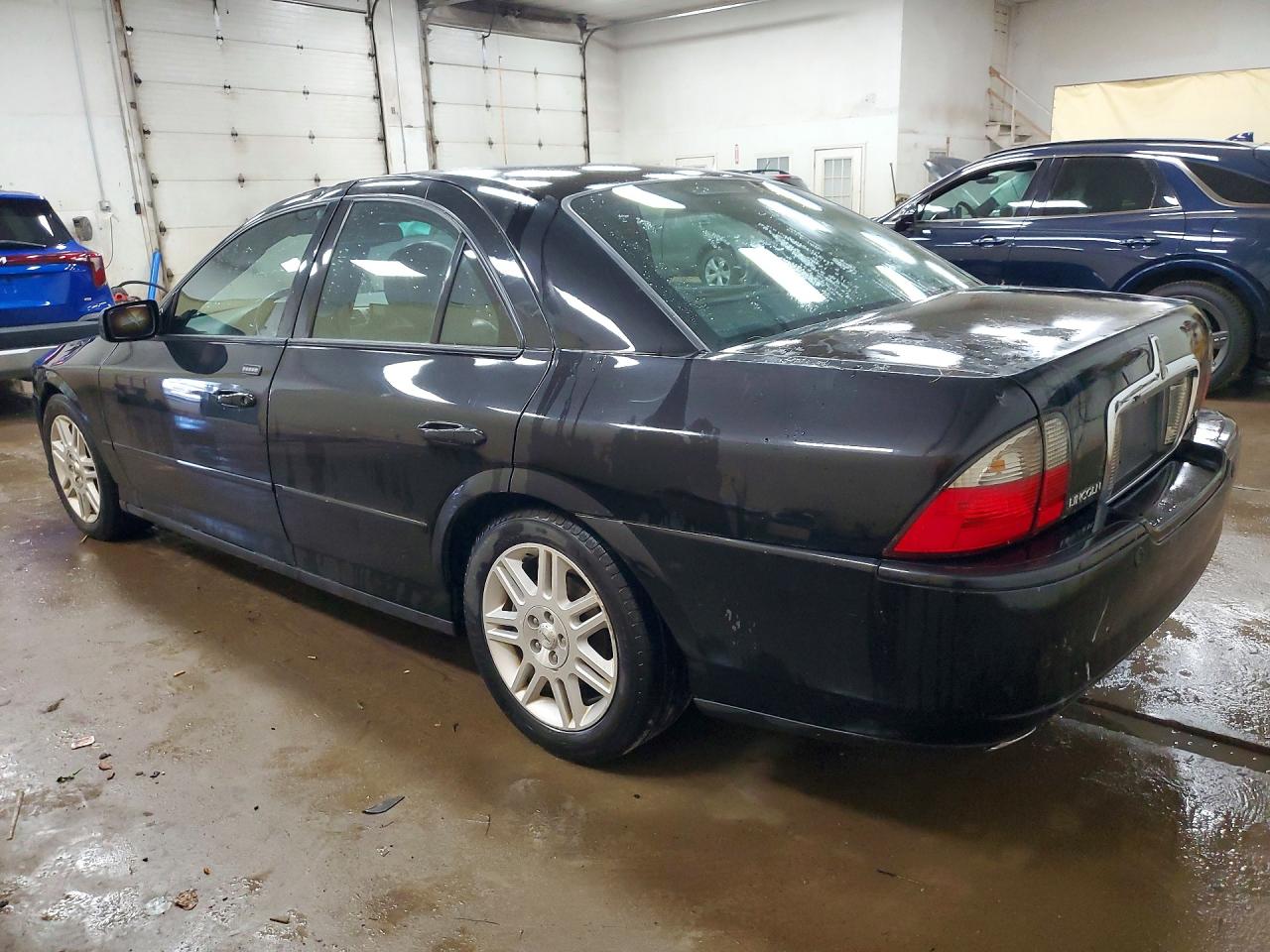 2005 Lincoln Ls Черный vin: 1LNHM87A85Y662790