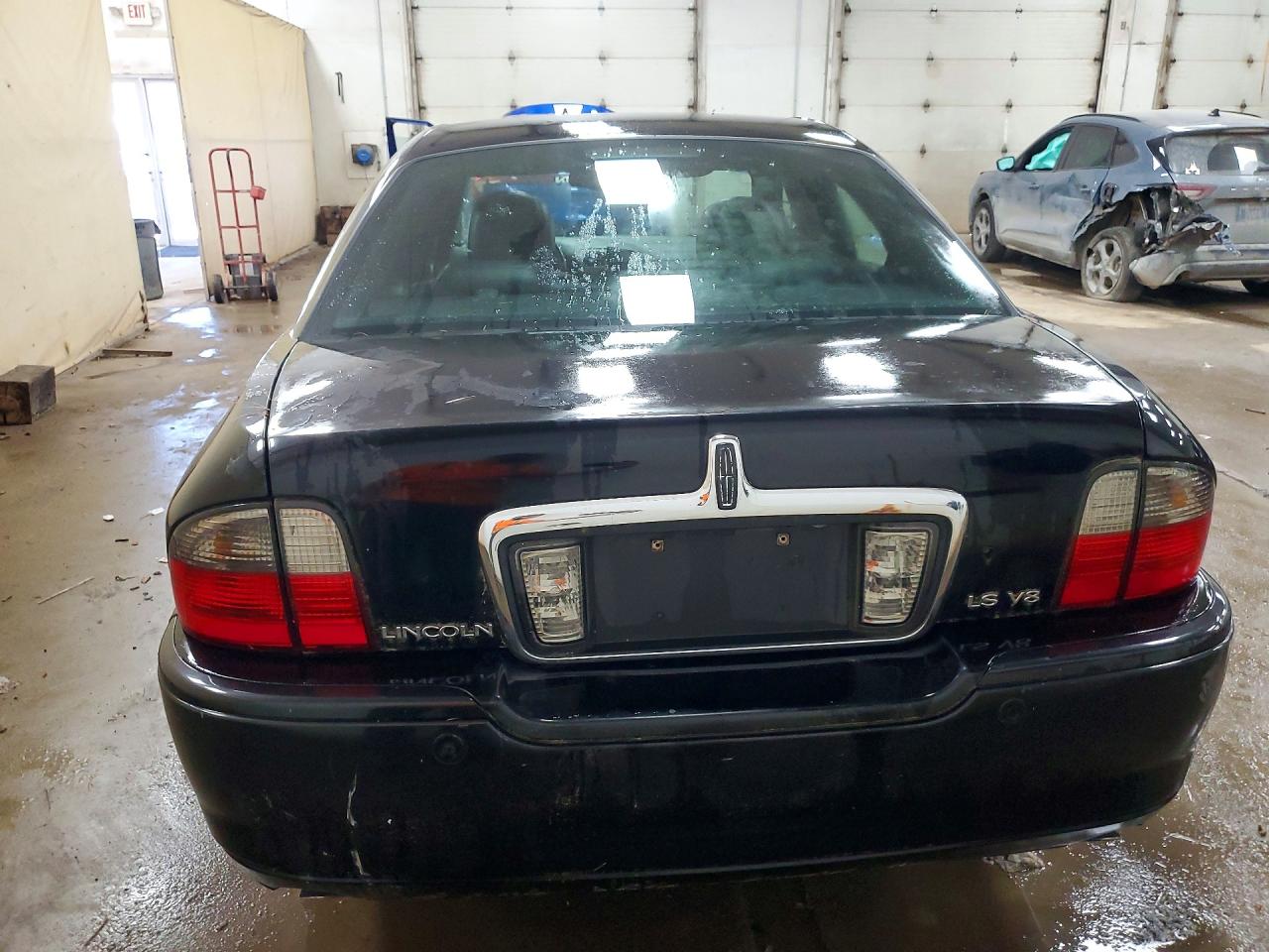 2005 Lincoln Ls Черный vin: 1LNHM87A85Y662790