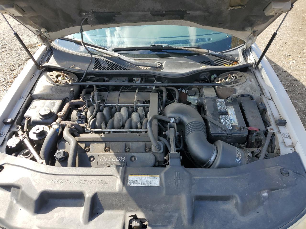 1999 Lincoln Continental Серебряный vin: 1LNHM97V0XY656705