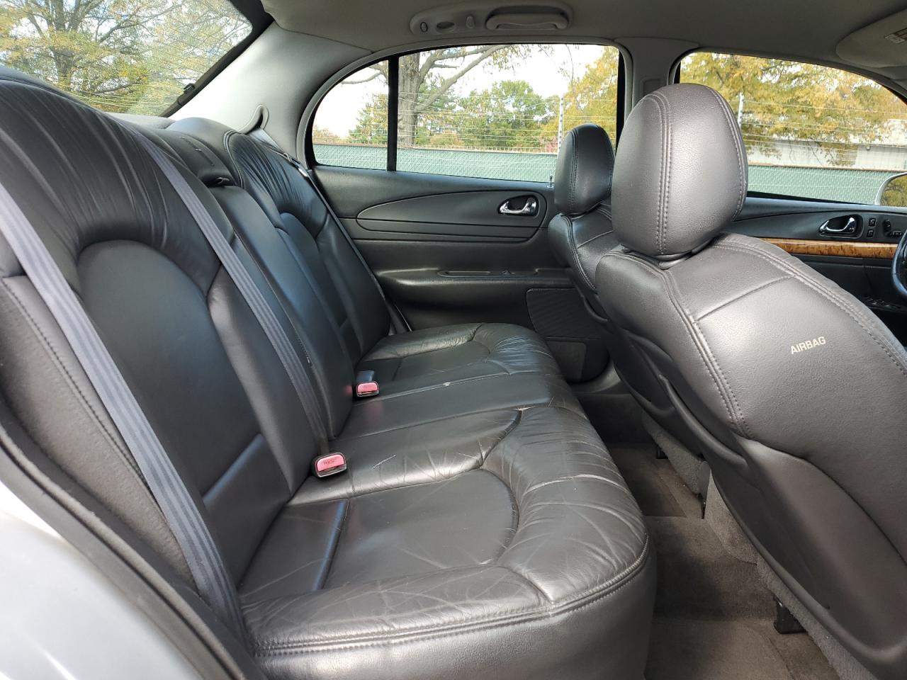 1999 Lincoln Continental Серебряный vin: 1LNHM97V0XY656705