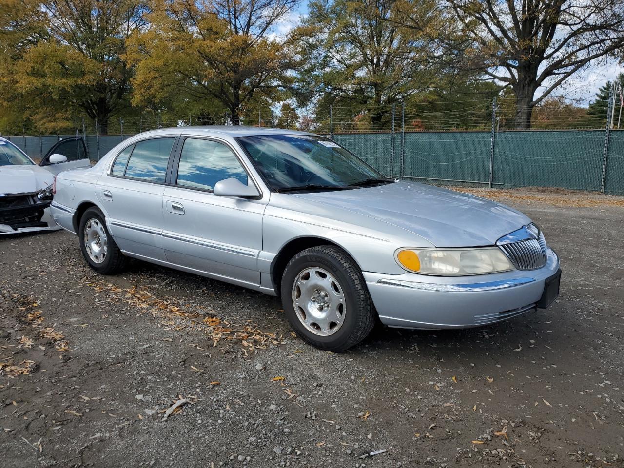 1999 Lincoln Continental Серебряный vin: 1LNHM97V0XY656705