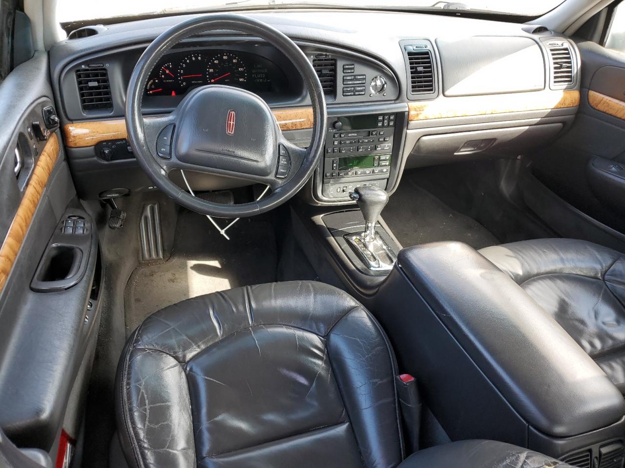 1999 Lincoln Continental Серебряный vin: 1LNHM97V0XY656705