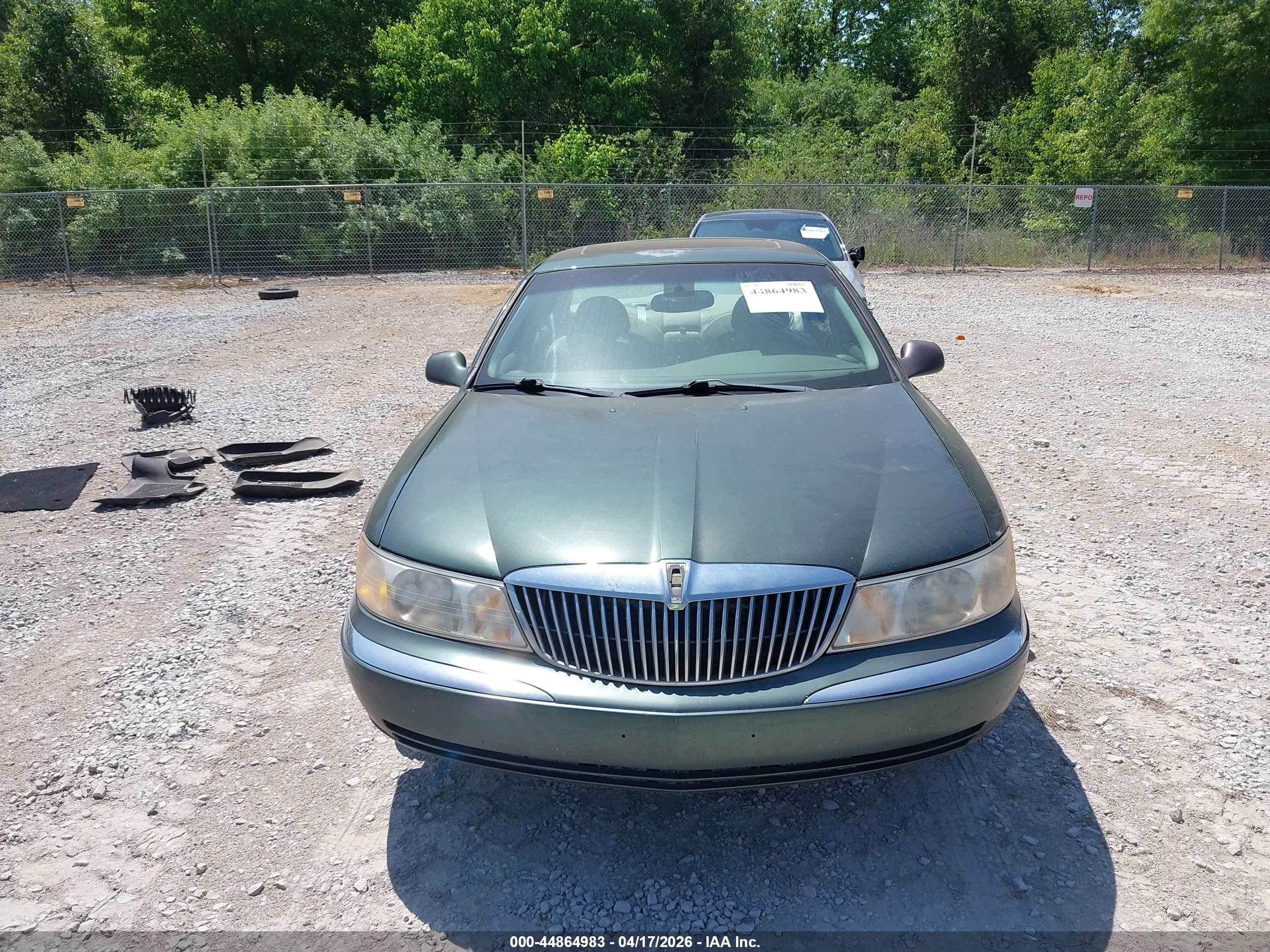 1999 Lincoln Continental   Green vin: 1LNHM97V0XY704705
