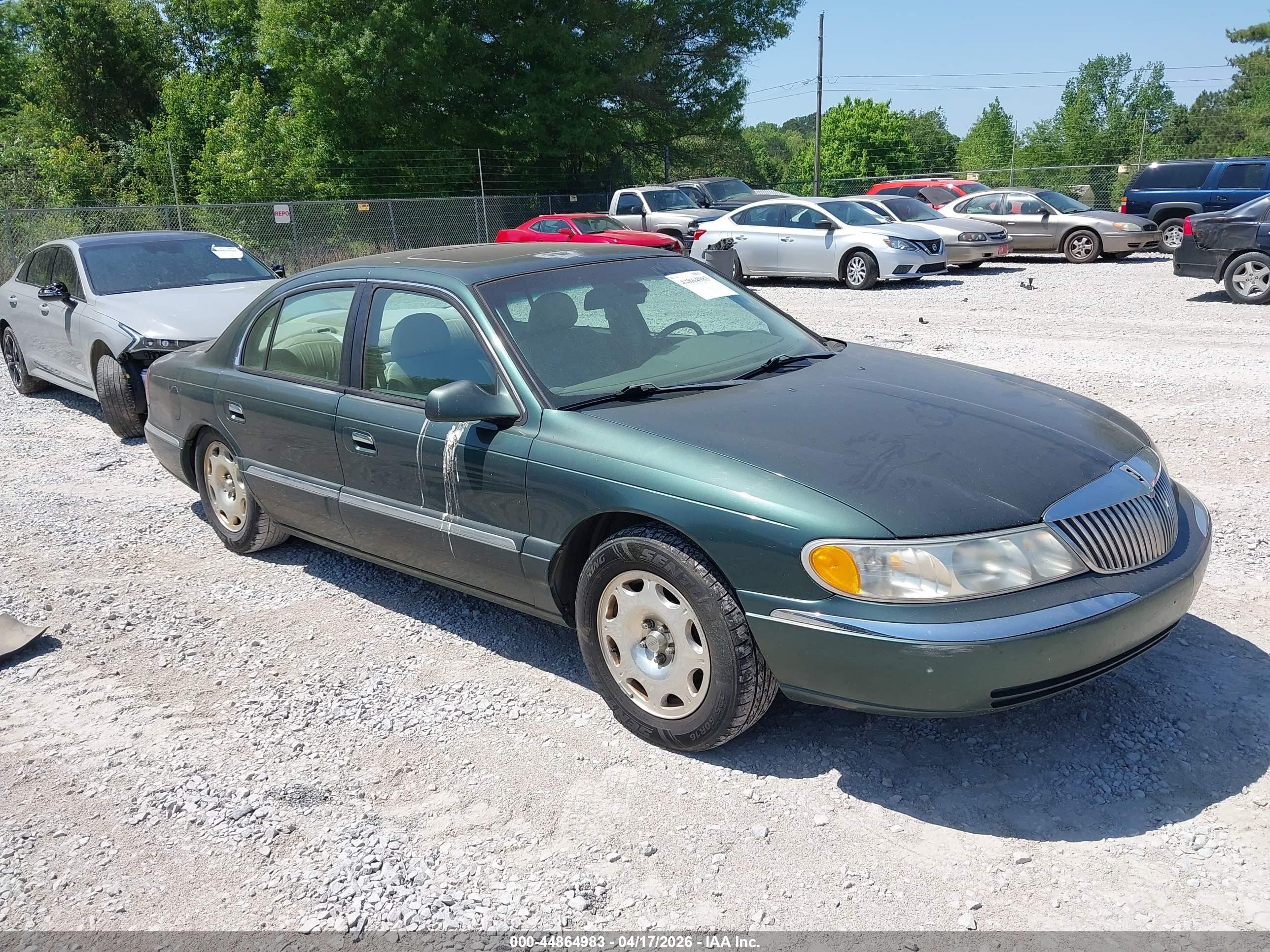 1999 Lincoln Continental   Green vin: 1LNHM97V0XY704705