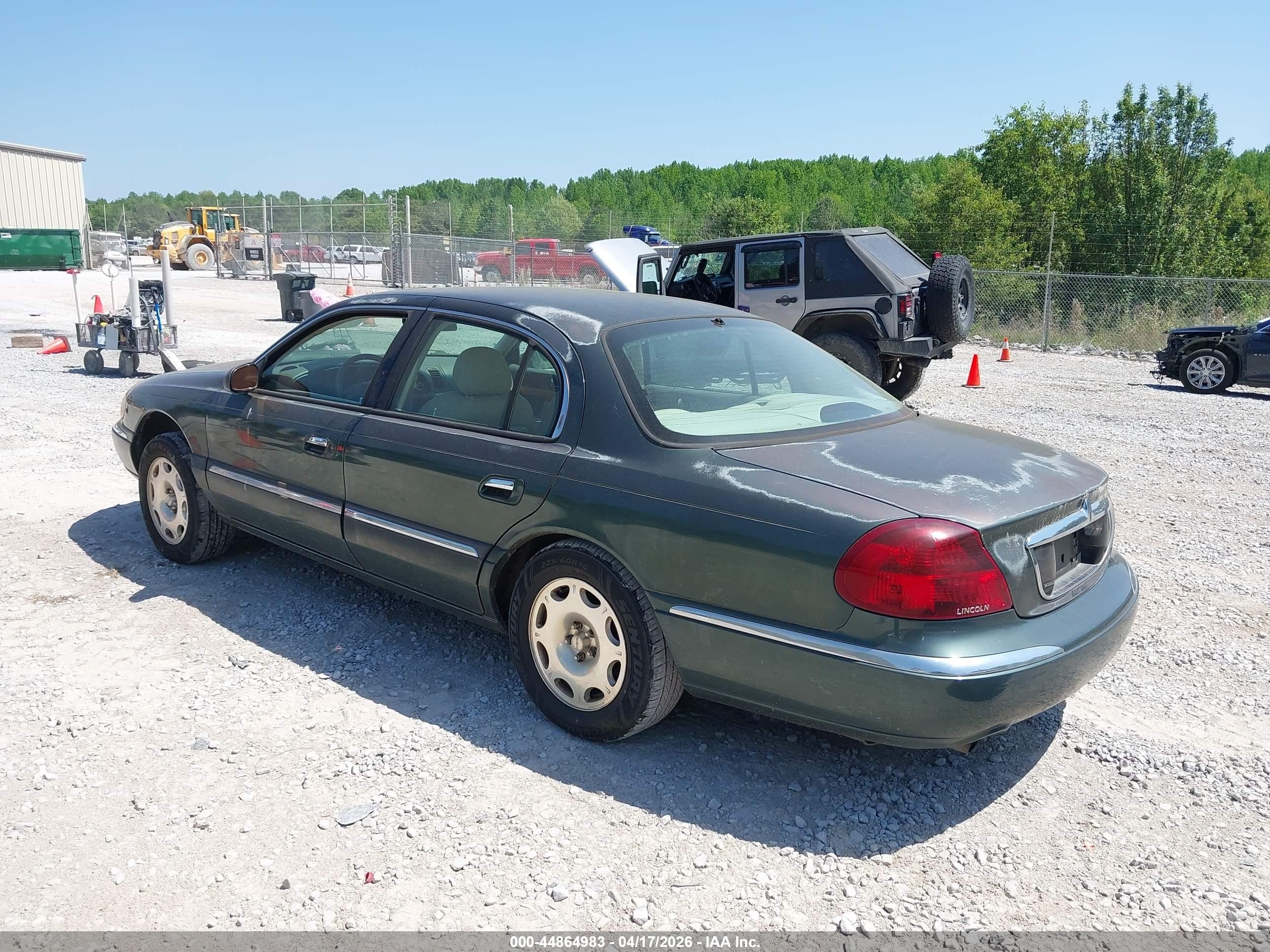 1999 Lincoln Continental   Green vin: 1LNHM97V0XY704705