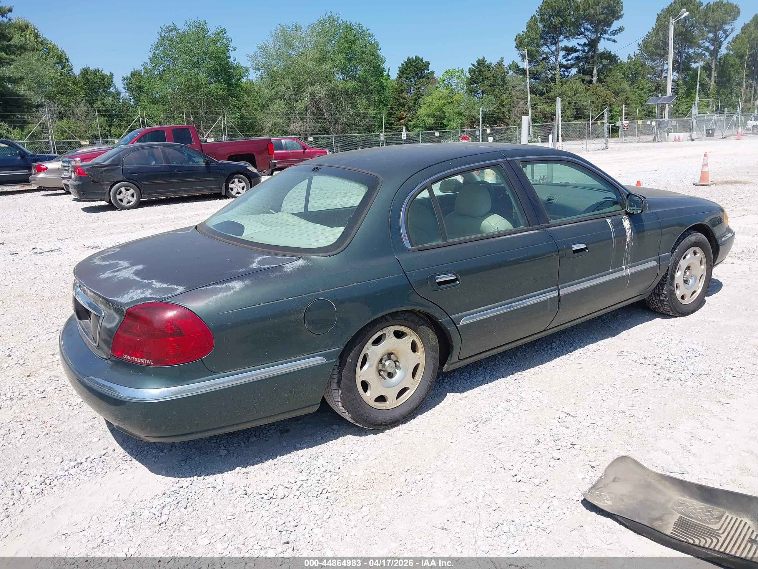 1999 Lincoln Continental   Green vin: 1LNHM97V0XY704705