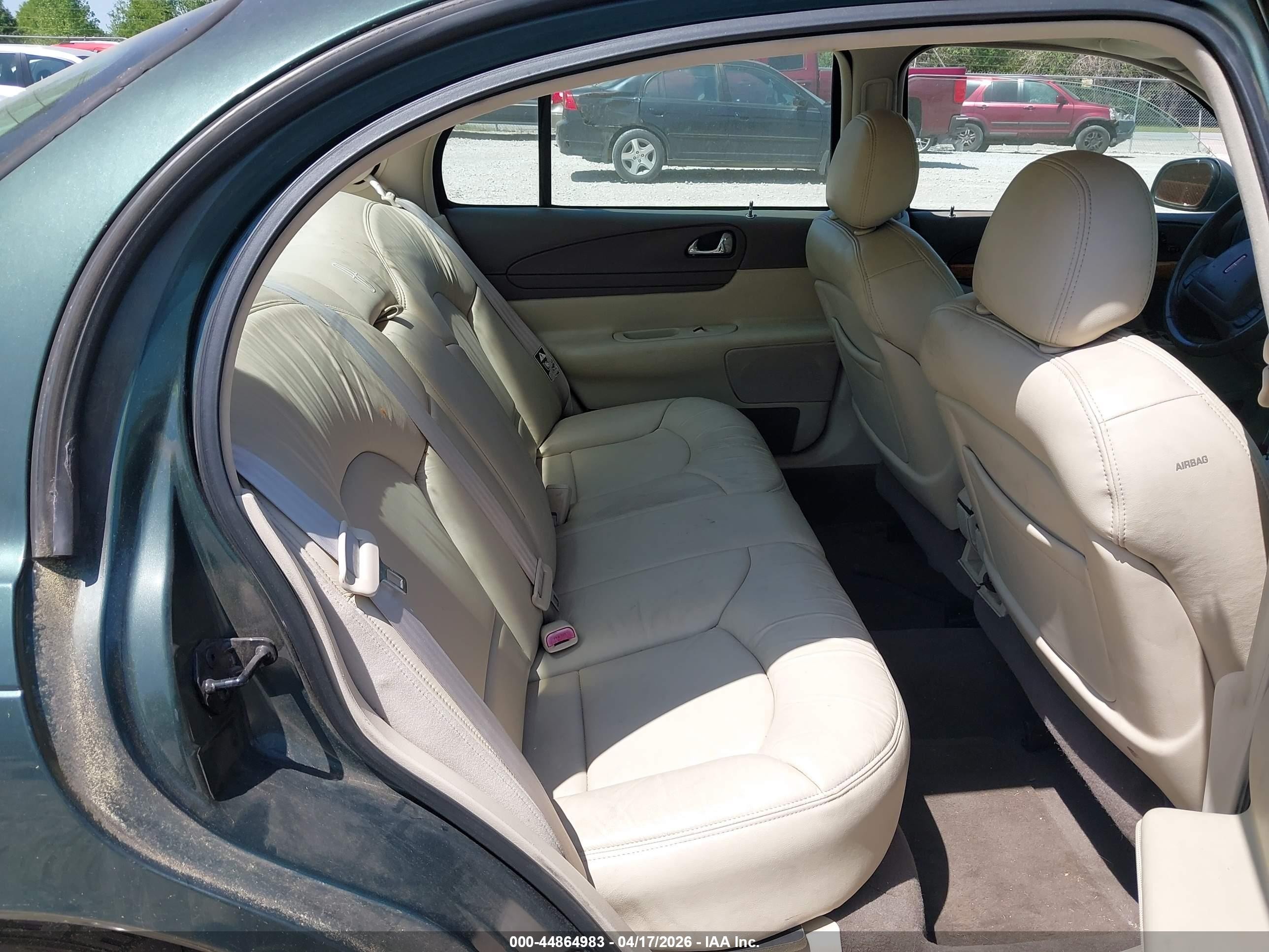 1999 Lincoln Continental   Green vin: 1LNHM97V0XY704705