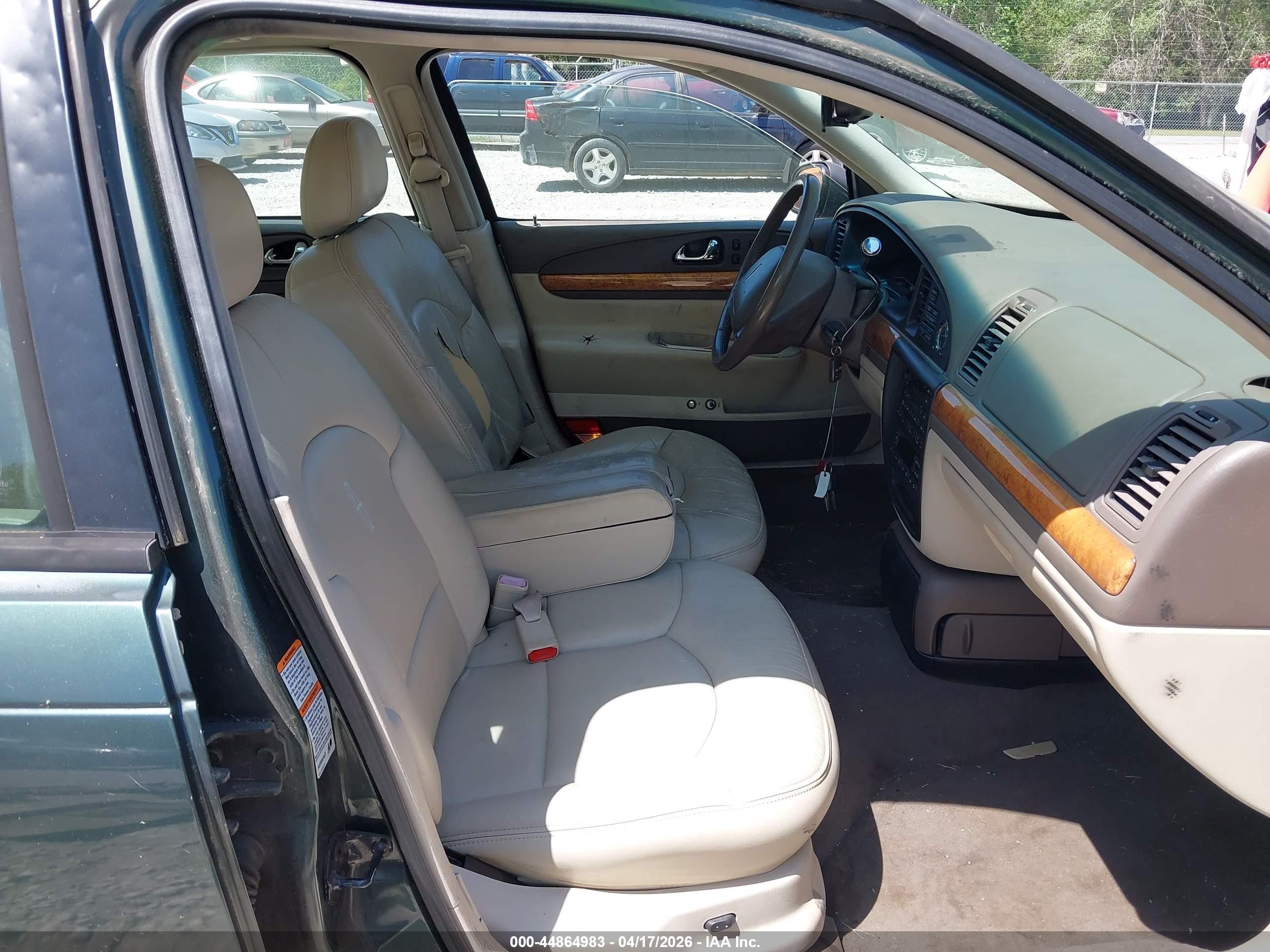 1999 Lincoln Continental   Green vin: 1LNHM97V0XY704705