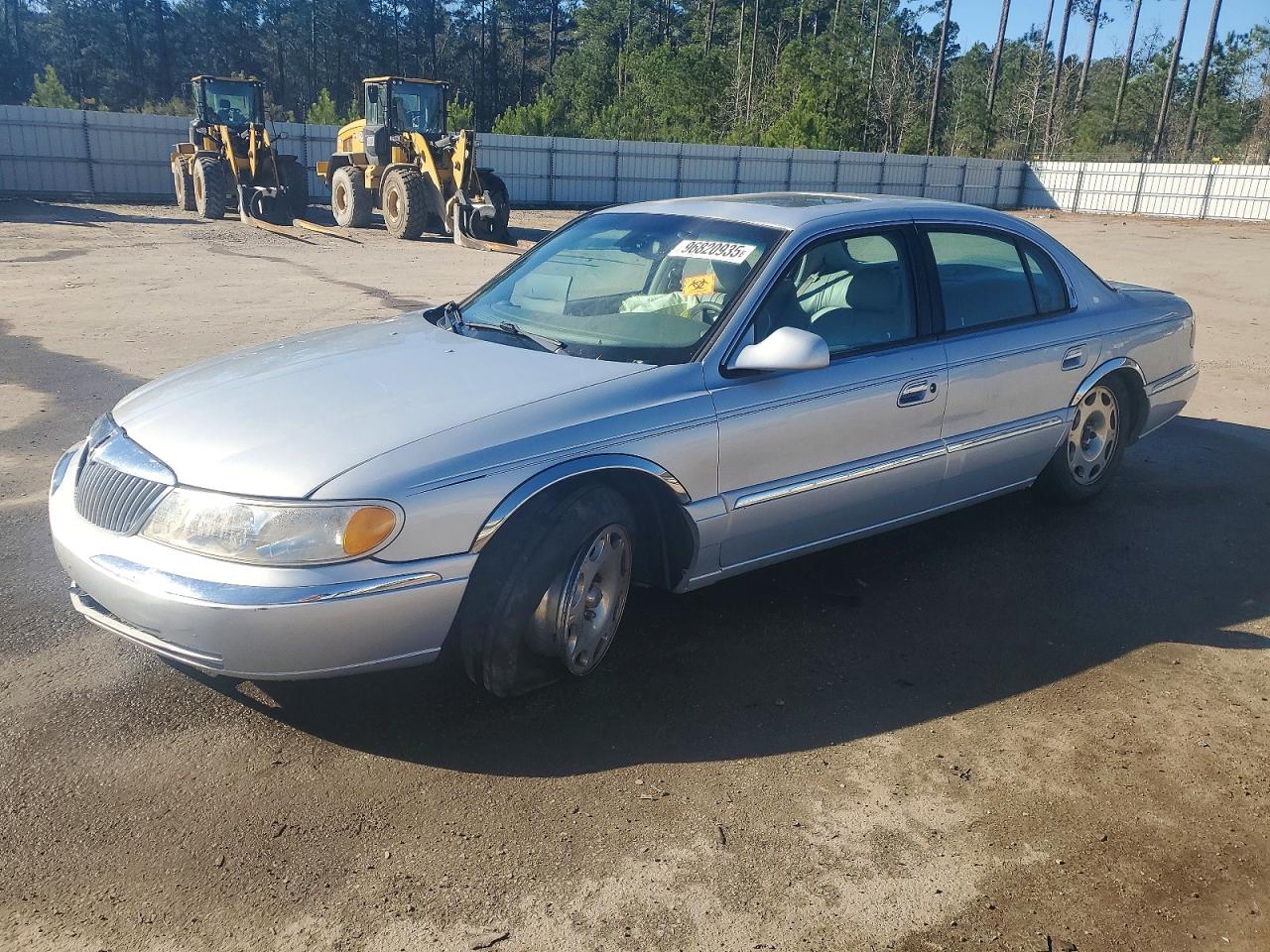 1999 Lincoln Continental Silver vin: 1LNHM97V0XY721200