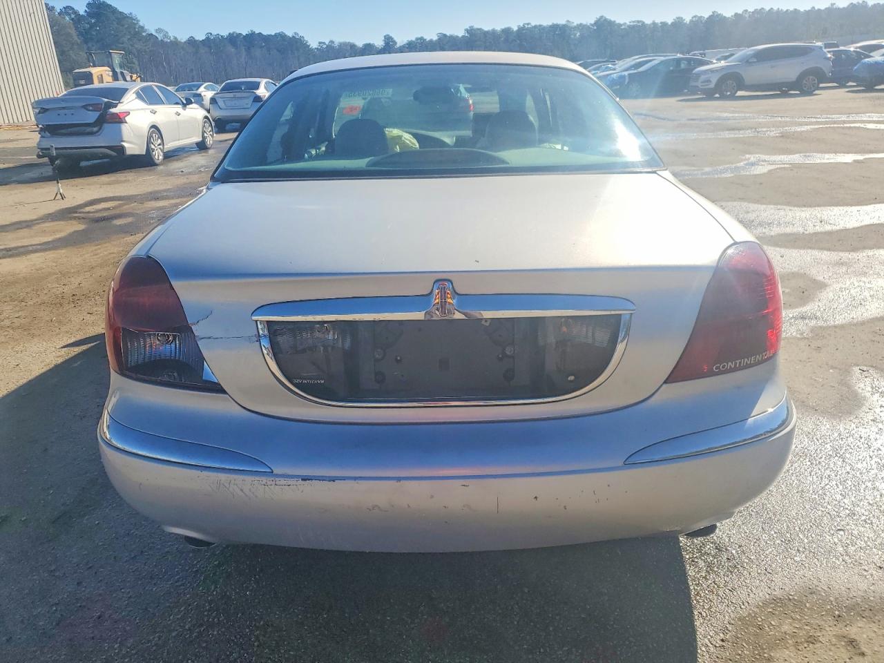 1999 Lincoln Continental Silver vin: 1LNHM97V0XY721200