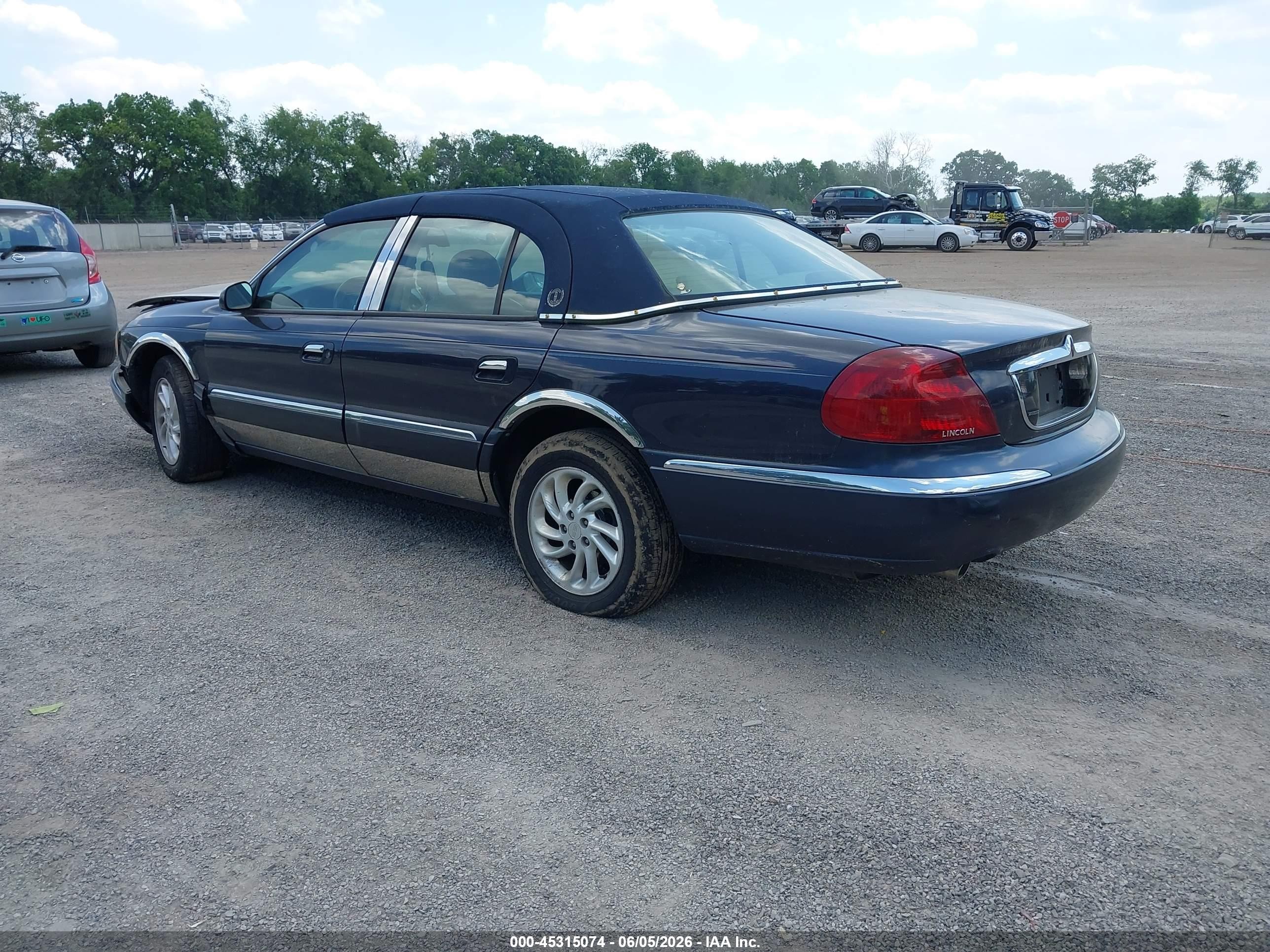 2000 Lincoln Continental Black vin: 1LNHM97V0YY764291